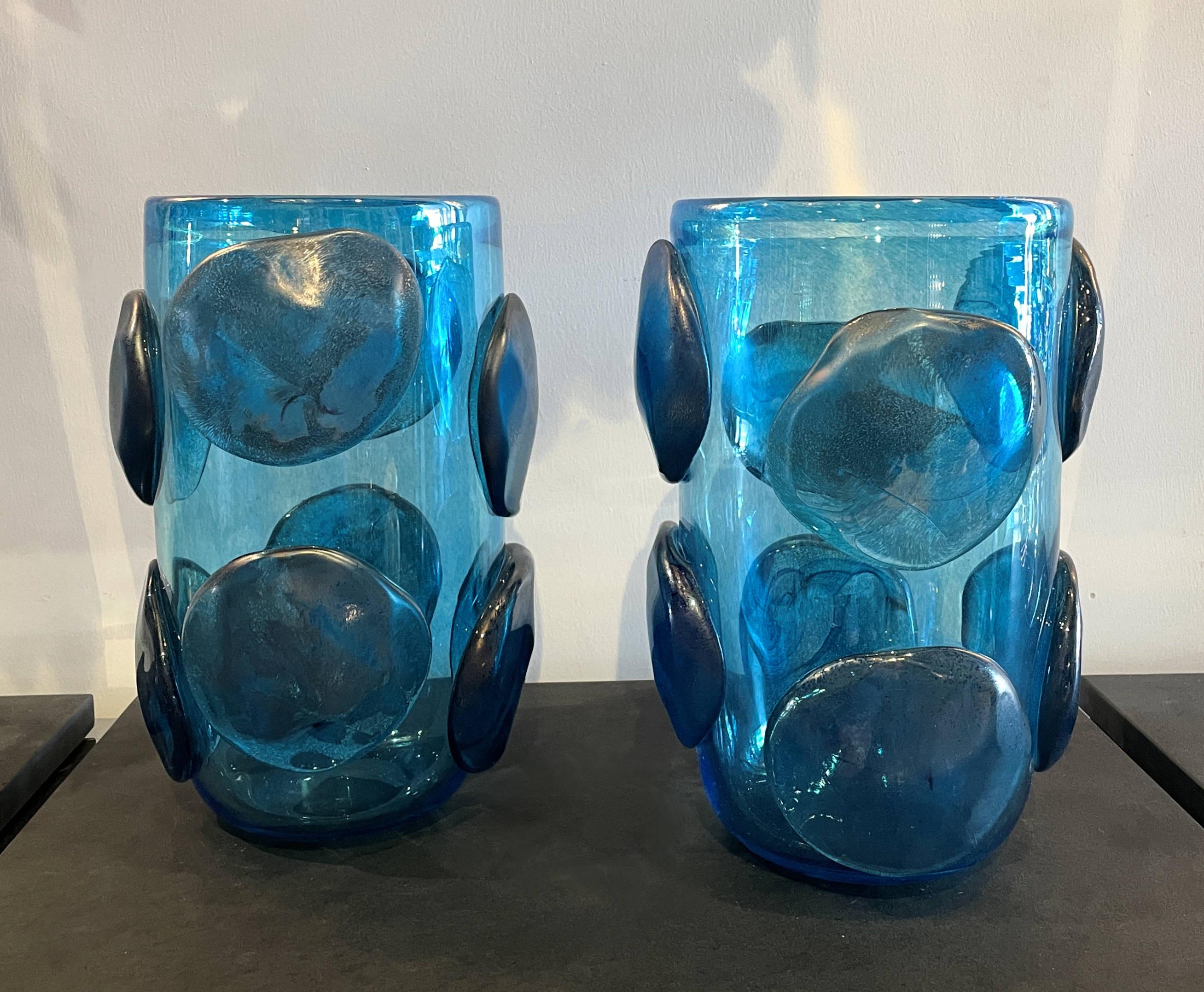 Pair of murano hand blown vases made of opaline glass by the Italian artist glassblower Costantini. The body is decorated with round freeform reliefs. These exquisite Venetian vases are signed underneath, Italy, 1980s.