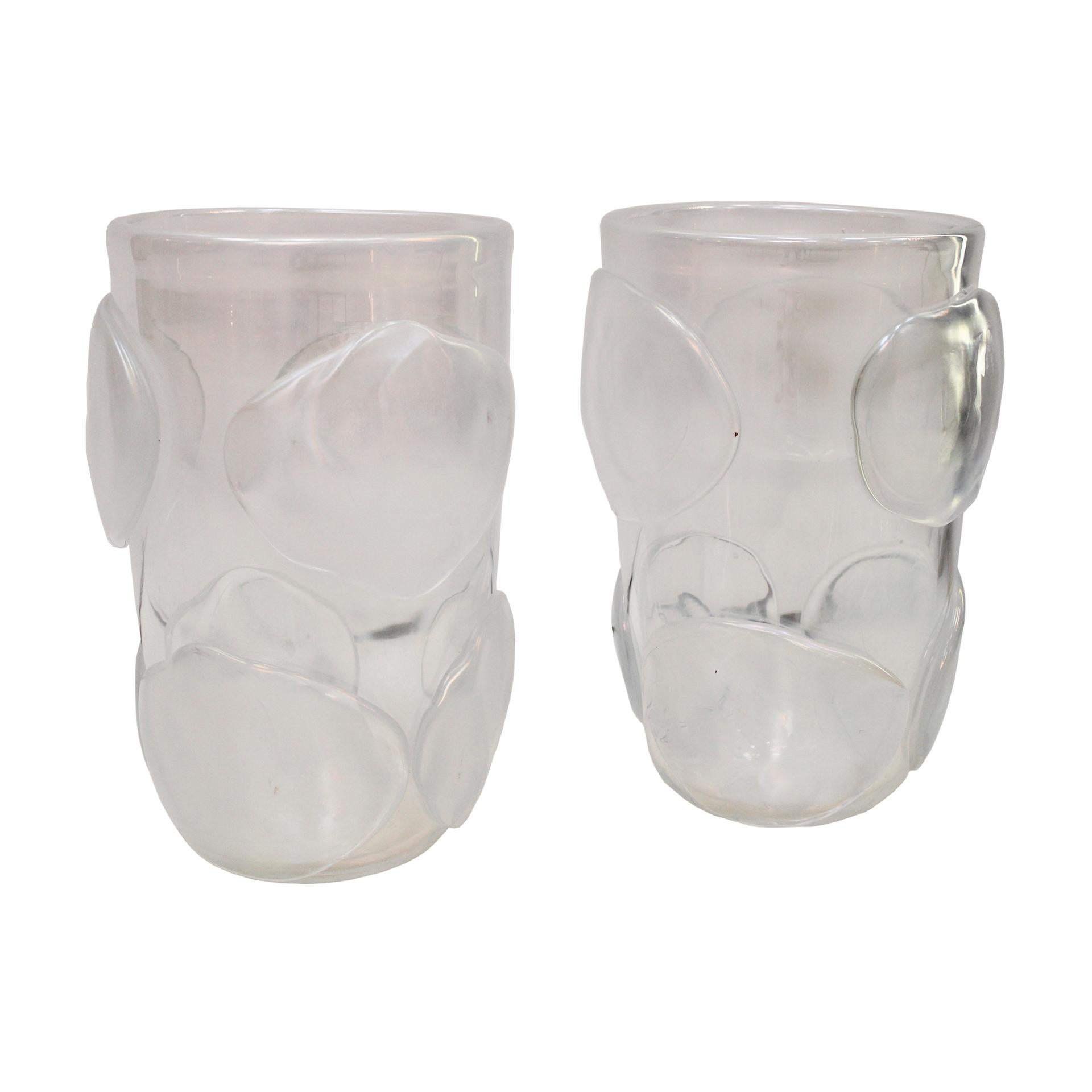 Pair of Murano hand blown vases made of opaline glass by the Italian artist glassblower Costantini. The body is decorated with round freeform reliefs.

These exquisite Venetian vases are signed underneath, Italy, 1980s.

Every item LA Studio offers