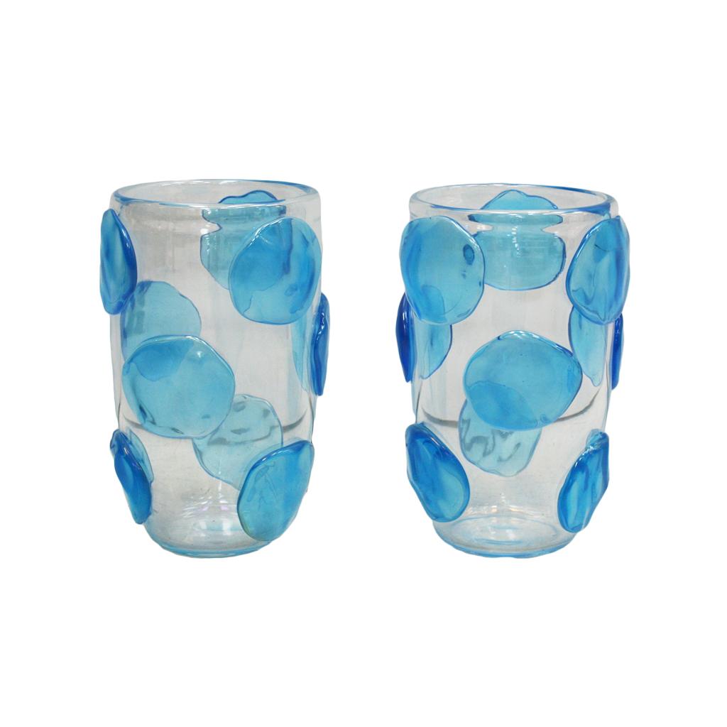 Pair of Murano hand blown vases made of opaline glass by the Italian artist glassblower Costantini. The body is decorated with round freeform reliefs.

These exquisite Venetian vases are signed underneath, Italy, 1980s.