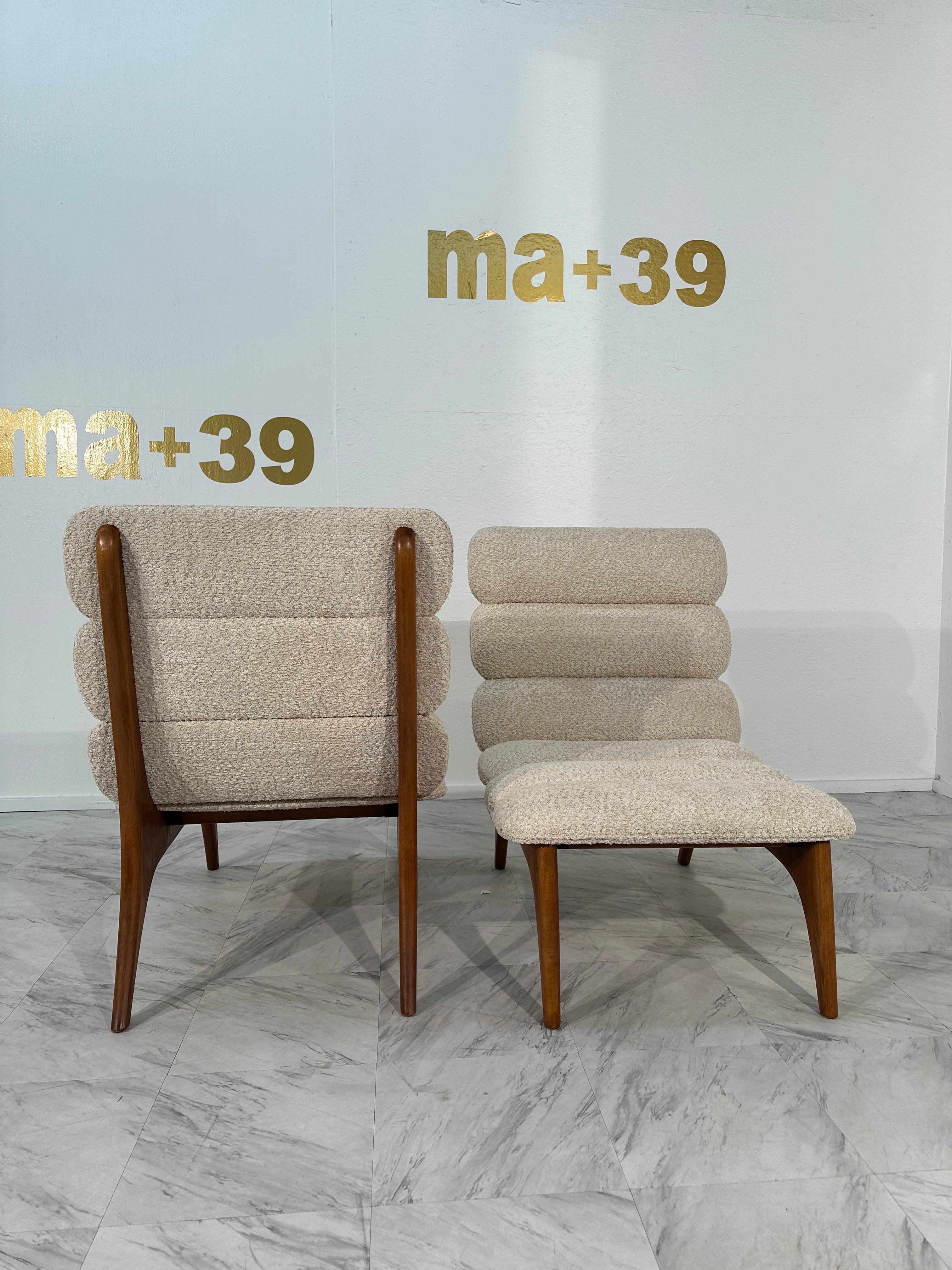The Pair of Mid-Century Modern Danish Lounge Chairs in Boucle Fabric from the 1980s epitomizes the iconic Scandinavian design ethos of simplicity, functionality, and comfort. Crafted with precision and attention to detail, these chairs feature clean