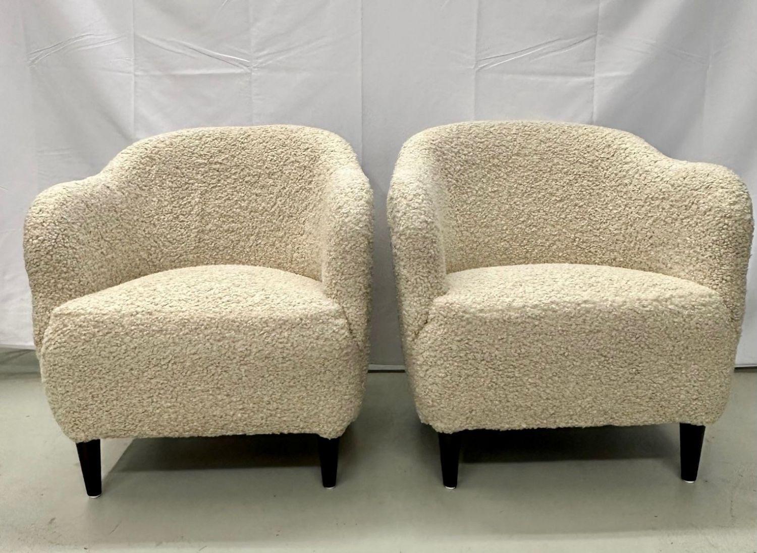 Pair of Mid-Century Modern danish lounge / club chairs, boucle, Denmark, 1950s
Low profile pair of mid-century lounge or club chairs designed and produced in Denmark, 1950s. Newly upholstered in a thick luxurious beige boucle/faux Sherpa fabric.
