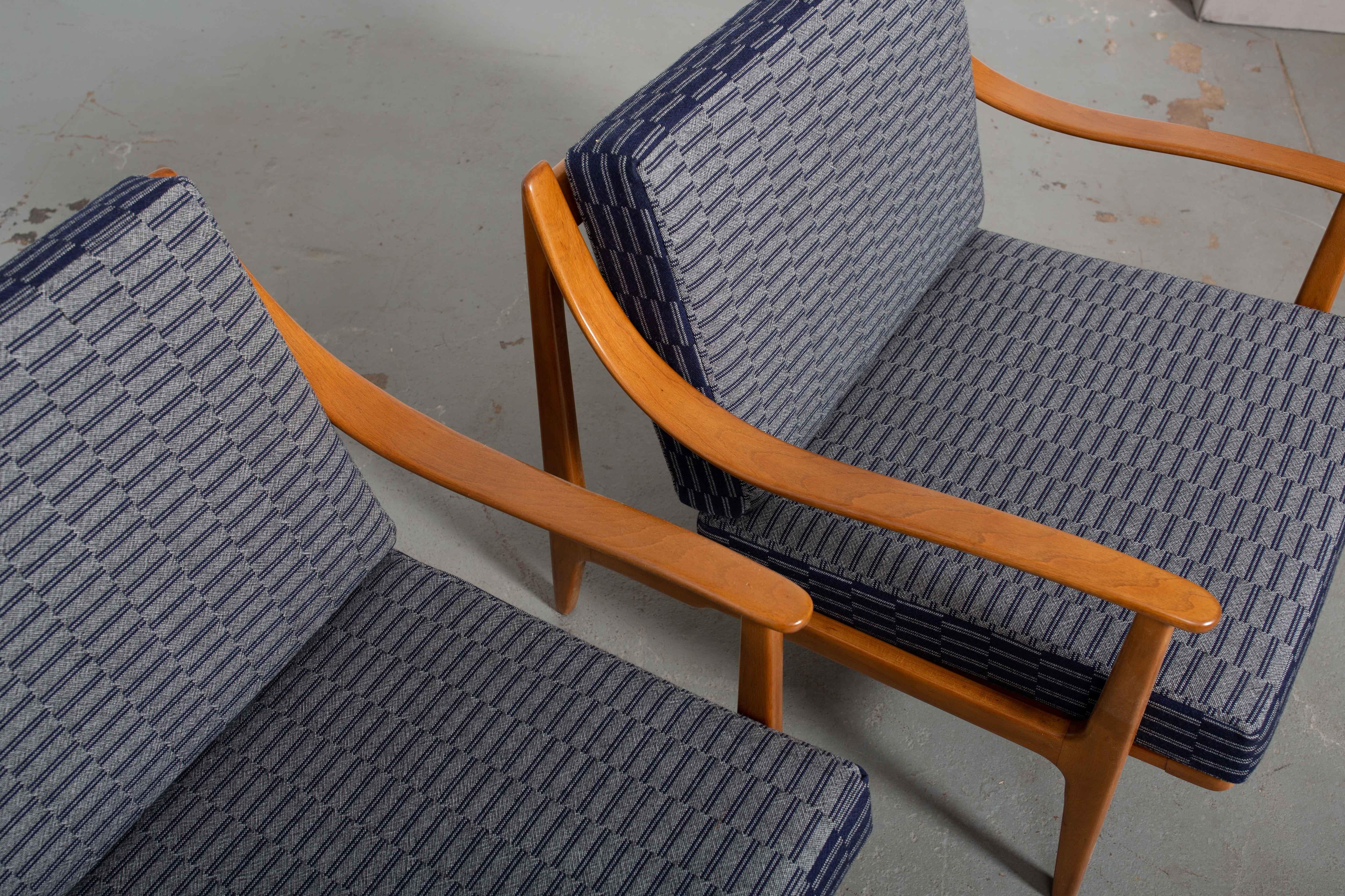 Newly restored pair of Danish modern lounge chairs with bentwood arms and tapered legs. Textile is a navy and white Scottish wool pattern designed by Eleanor Pritchard (England). Unique construction and beautiful curves!
21.25