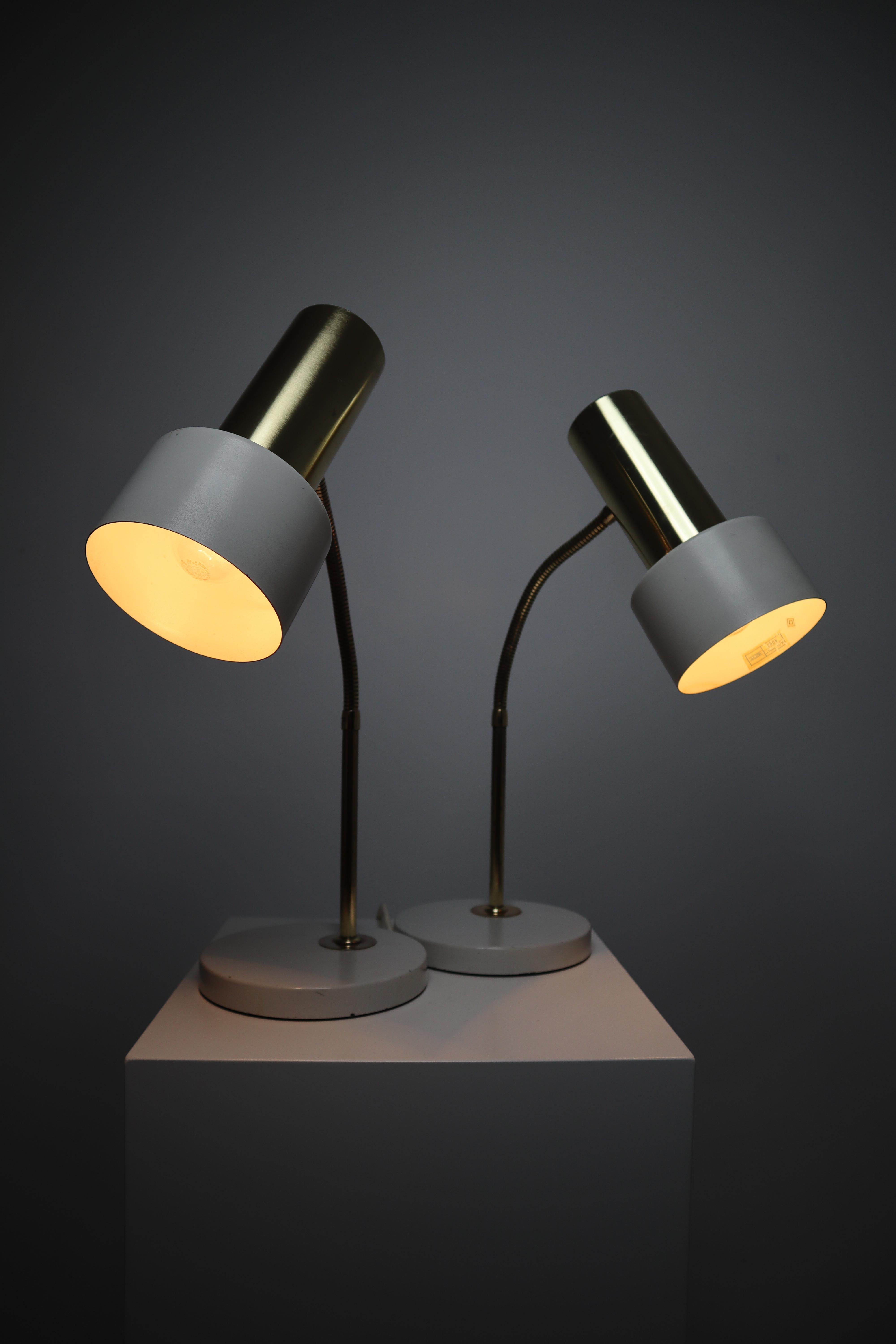Pair of Mid-Century Modern desk or table lamps, bedside lights, Germany, 1970s, very elegant design with brass details.