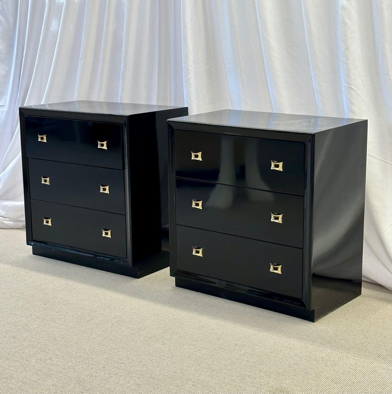 Pair of Mid-Century Modern Ebonized cabinets / nightstands, chests, lacquer
A stunning pair of large nightstands, commodes or chests in an ebony finish. Each having a floating front base with three drawers all having gilt gold pulls in the Art Deco