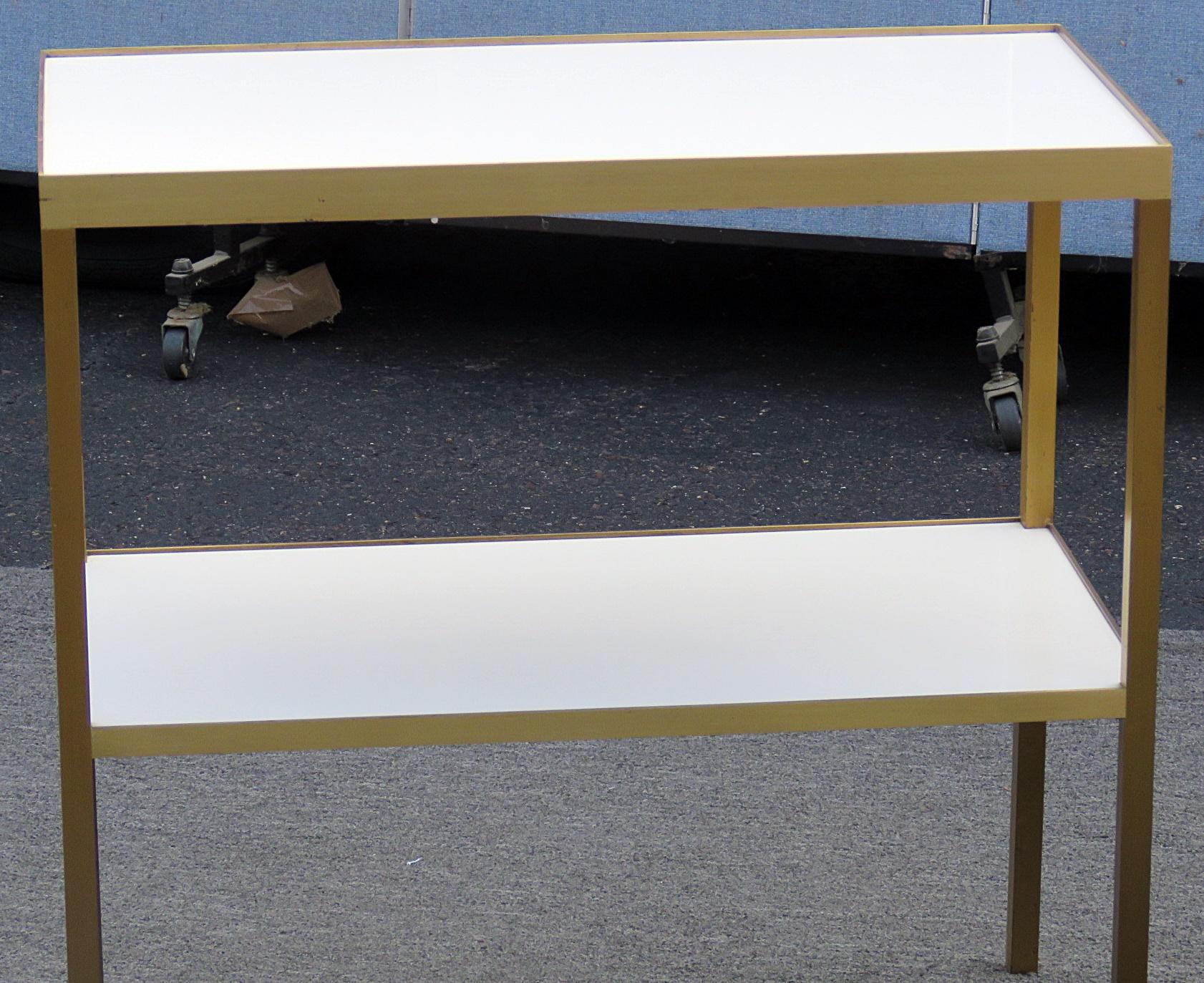 Pair of Mid-Century Modern two-tier end tables.