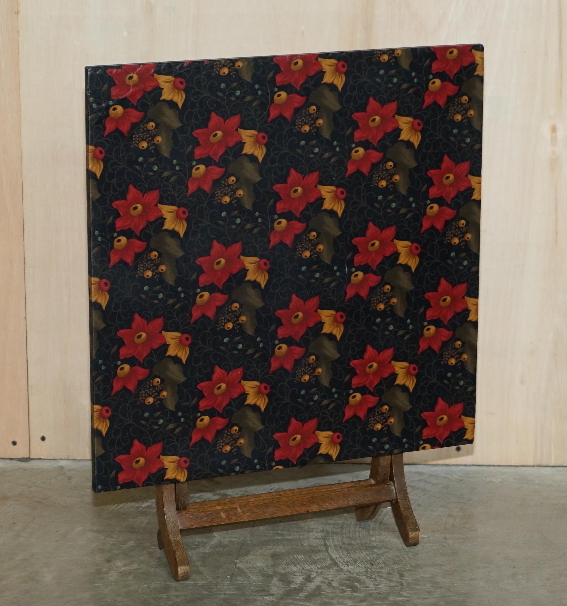 We are delighted to offer for sale this pair of lovely Mid Century Modern pine folding tables with floral covered tops 

A good looking, well made and decorative pair of folding side tables, in pine with nicely covered floral tops

These are