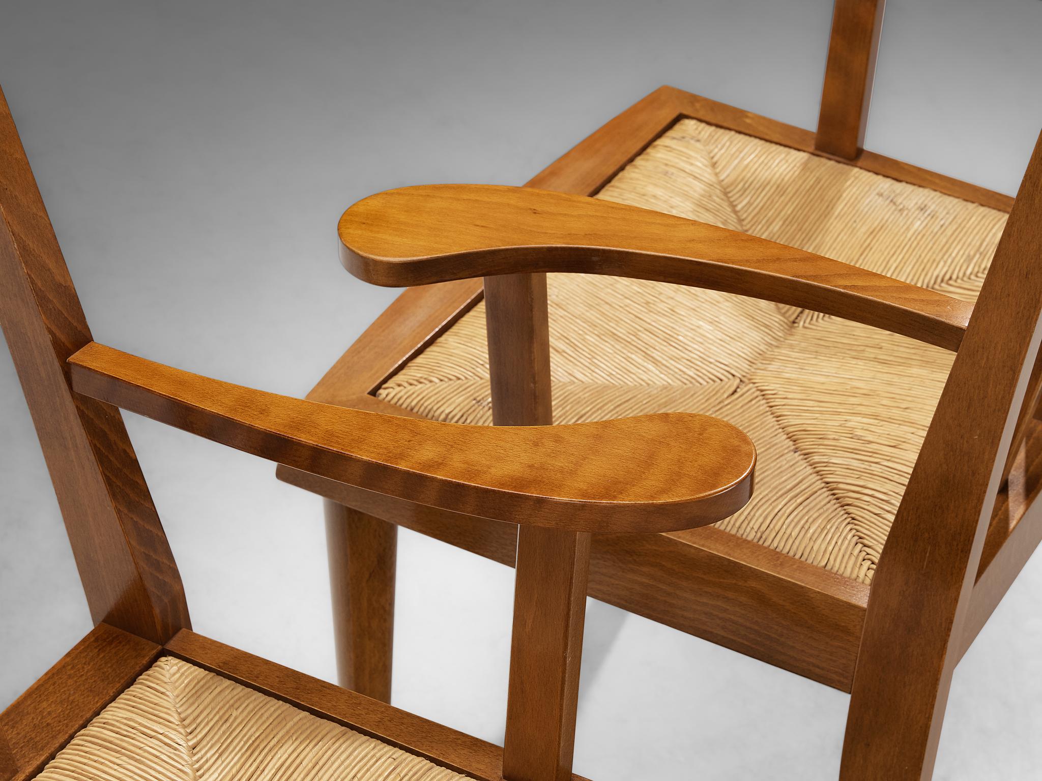 Mid-Century moderno Coppia di poltrone francesi moderne di metà secolo in legno caldo e giunco in vendita