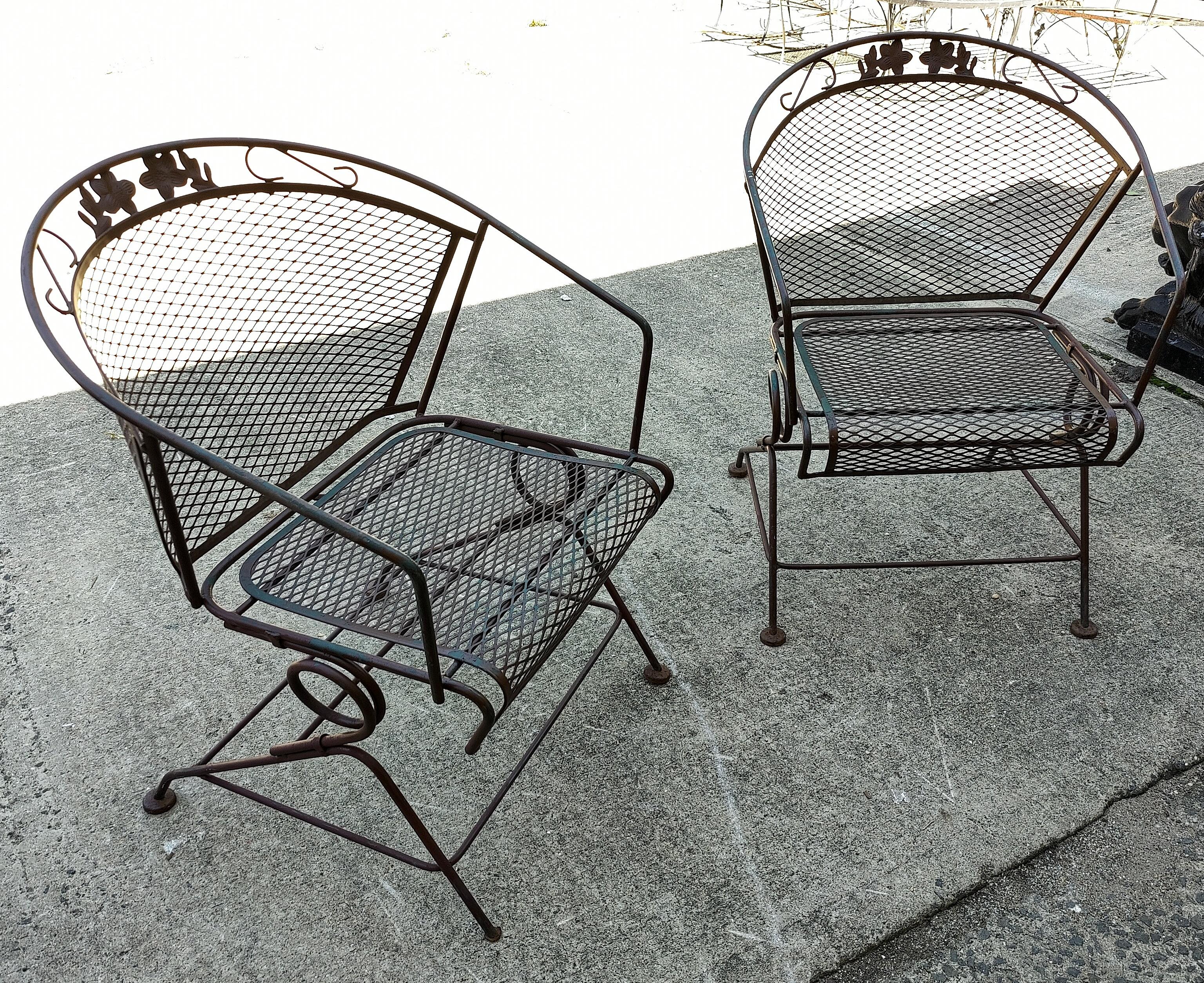 Vintage modern iron patio spring chairs. These gorgeous rockers feature elegant scrollwork and flower designs. Perfect for a deck, patio, or covered porch.

Please confirm item location (NY or NJ).