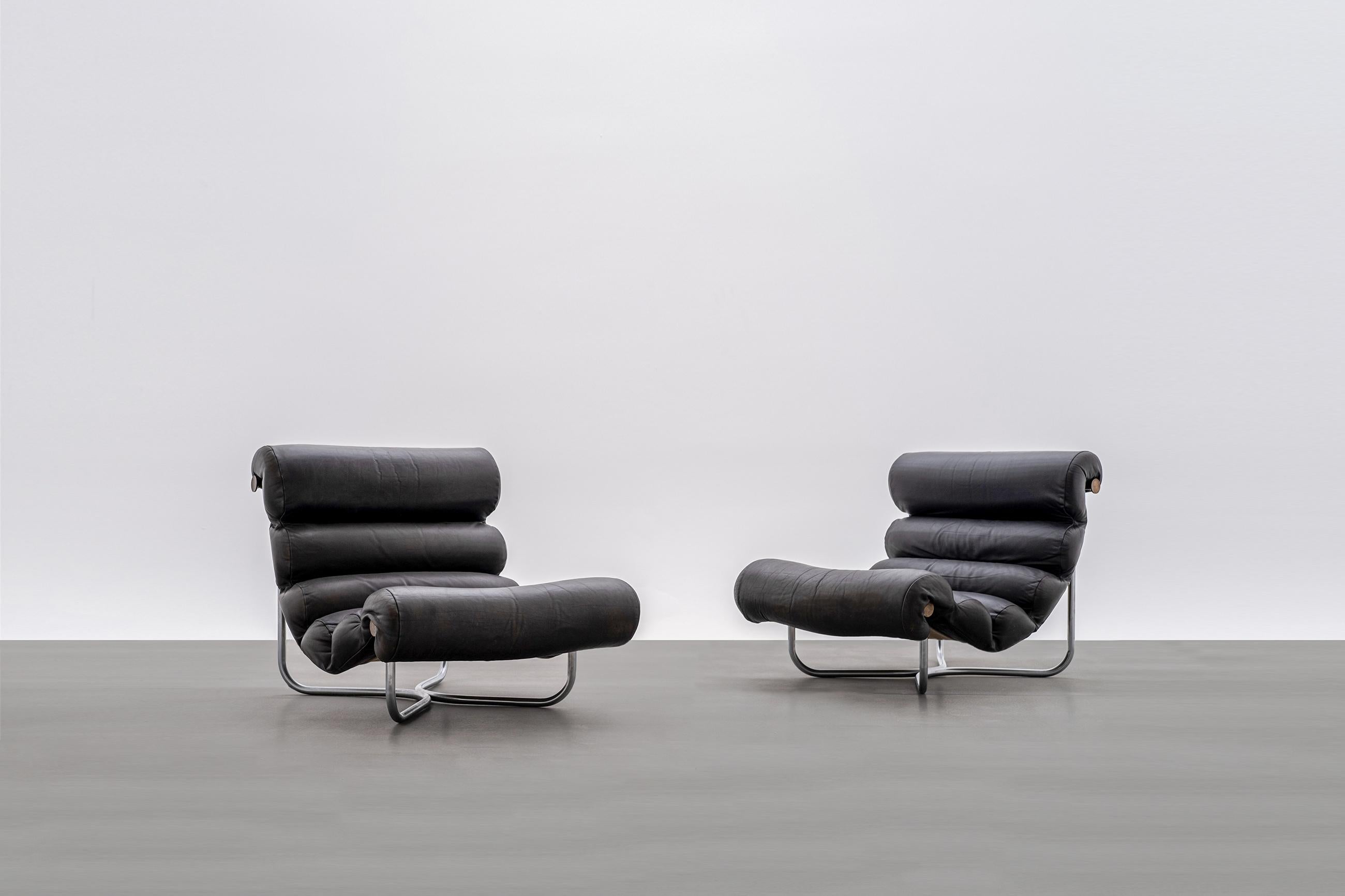 Unique pair of 'Glasgow' chairs by Georges van Rijck voor Beaufort, Belgium, 1960s. Matte chromed tubular frame, brass knobs and a canvas sling upholstered with leather at the top. Very relaxed and comfortable chairs in a great condition with a