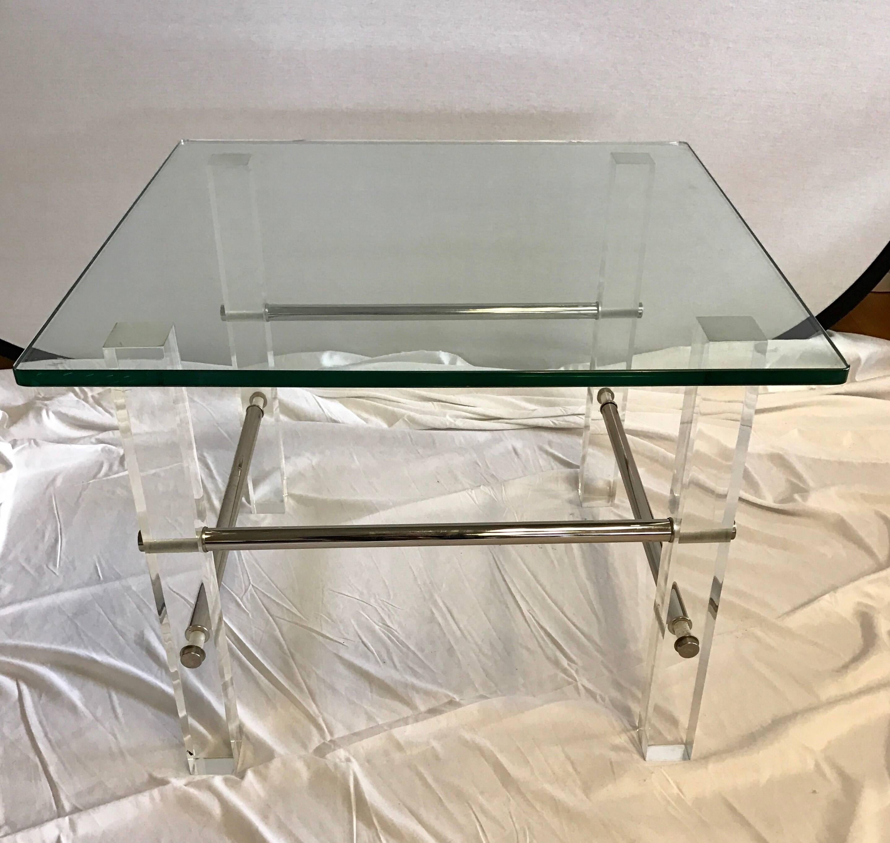 Mid-Century Modern Lucite and glass end tables with chrome bars throughout. In the style of Charles Hollis Jones but not signed, circa 1970s.