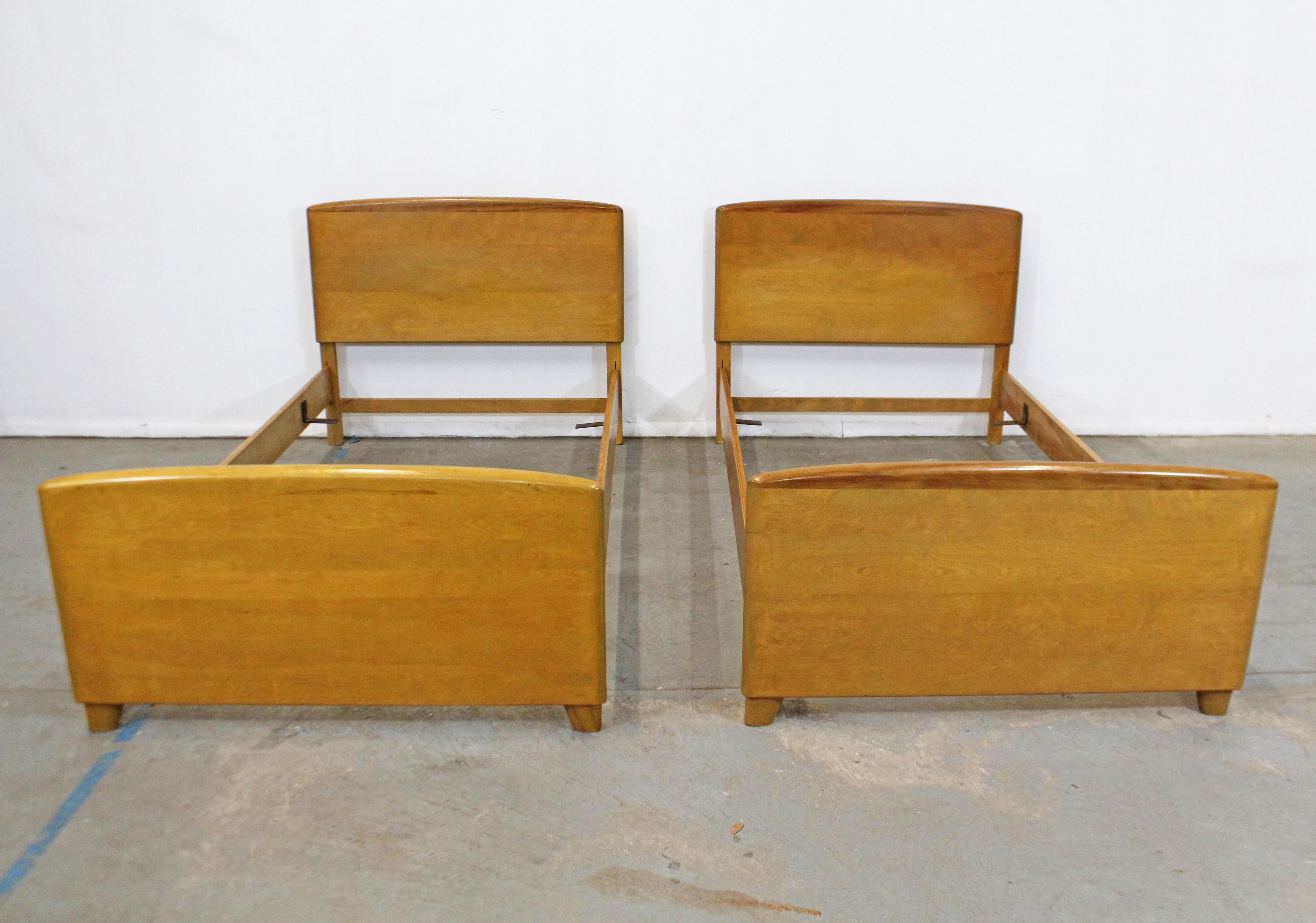 Pair of Mid-Century Modern Heywood Wakefield twin size bed frames

What a find. Offered is a pair of vintage Mid-Century Modern twin size bed frames by Heywood Wakefield. I believe they are wheat, but they are not labeled. Includes headboard, foot
