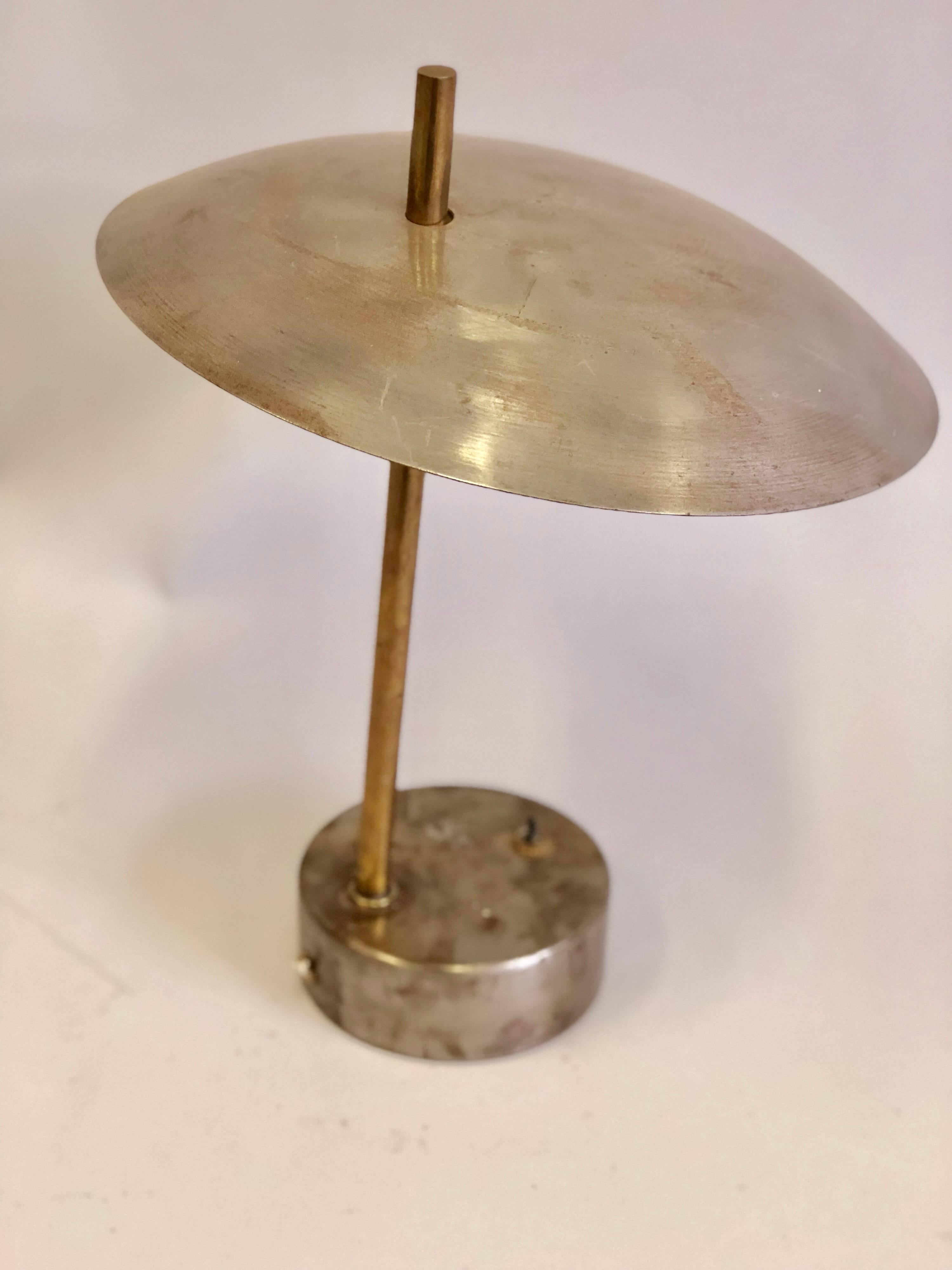 Pair of French Mid-Century Modern industrial steel and brass desk or table lamps.