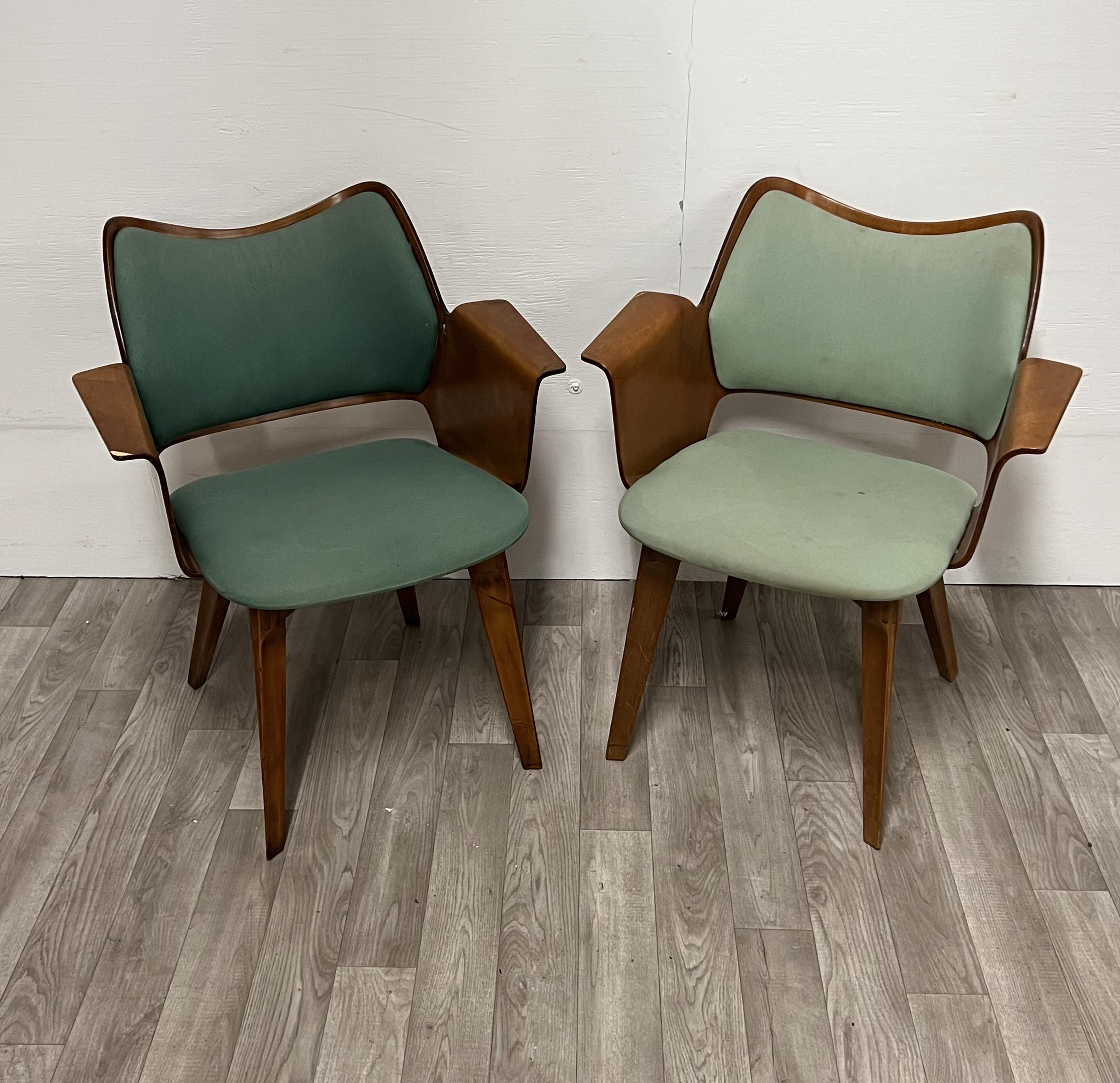 Pair of bent wood chairs that would look great in a small seating area or an office 
Very sleek lines Attributed to the 