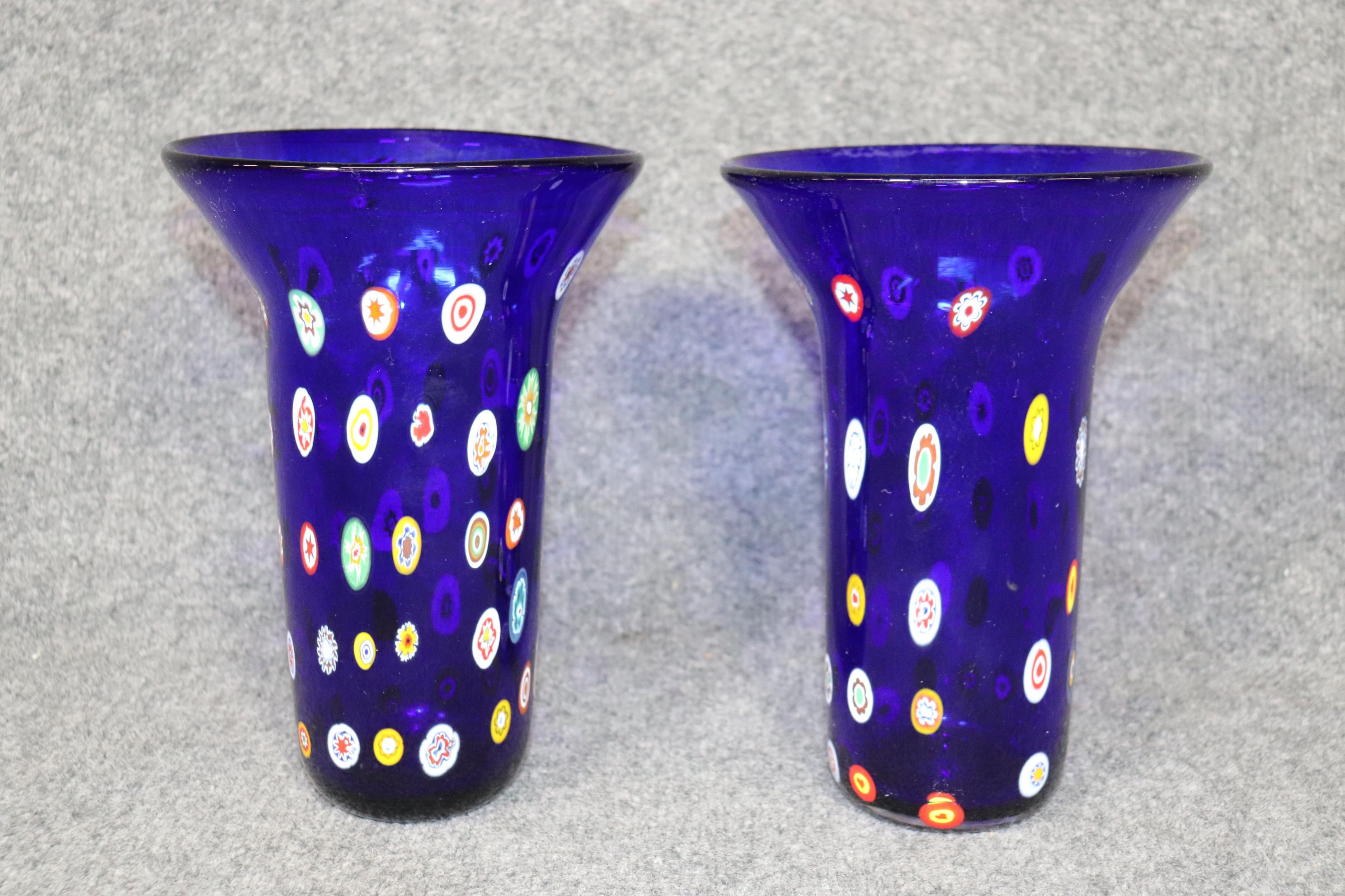 Dimensions: H: 10 1/2in W: 7 1/2in D: 7 1/2in 
This Mid-Century Modern Pair of Art Glass Murano Vases are truly exceptional and made of the highest quality! These vases are in immaculate condition for their age with only a few light surface