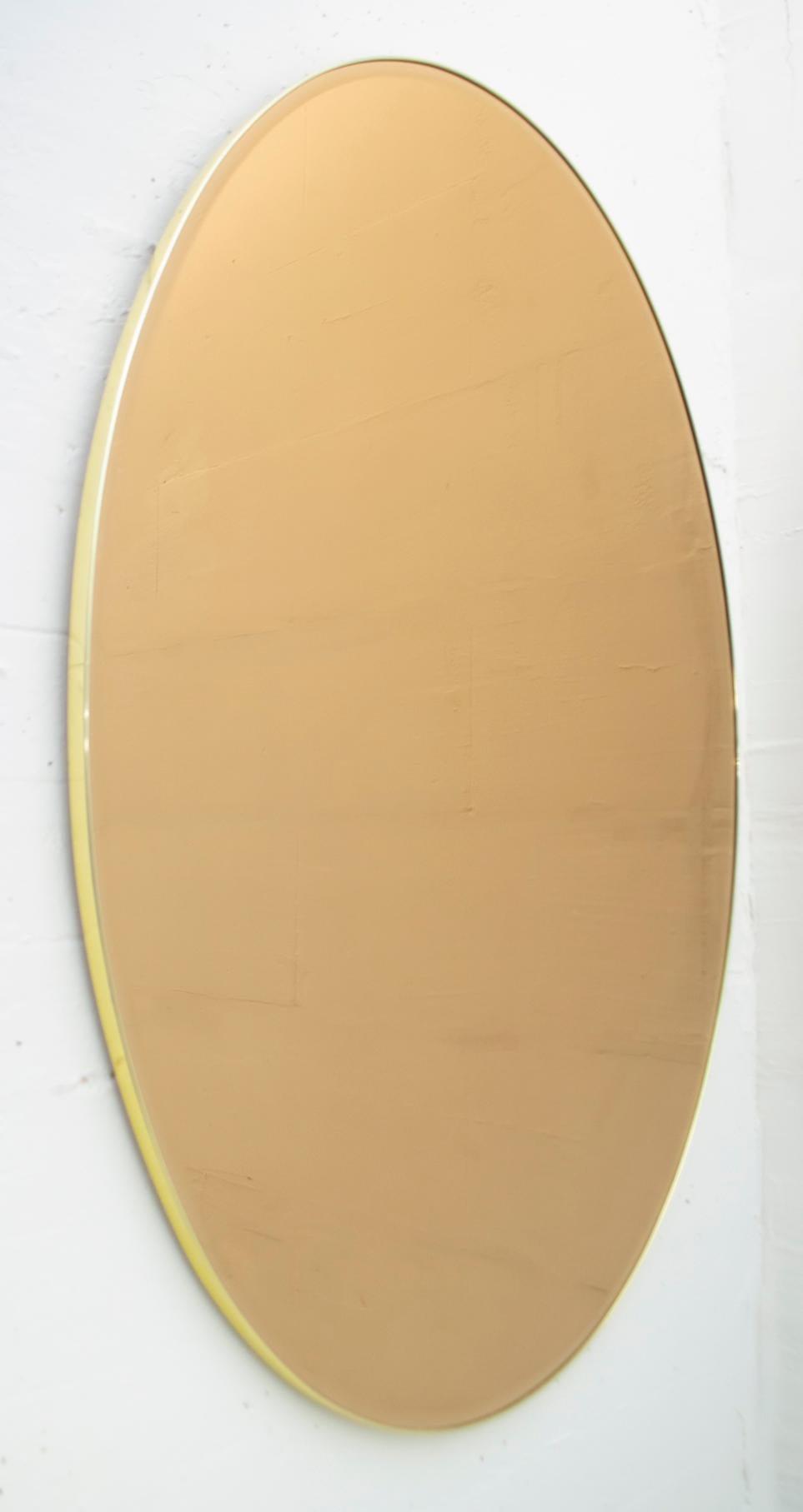 Pair of Mid-Century Modern Italian Oval Mirrors Brass and Bronzed Mirror, 1970 In Good Condition For Sale In Puglia, Puglia