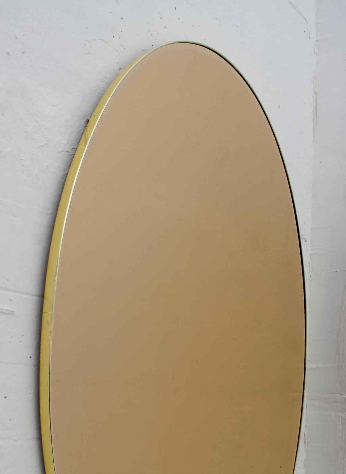 Pair of Mid-Century Modern Italian Oval Mirrors Brass and Bronzed Mirror, 1970 For Sale 1