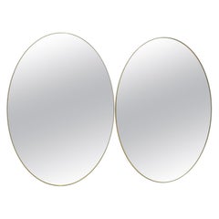 Paire de miroirs ovales italiens modernes du milieu du siècle dernier, laiton et bronze, 1970