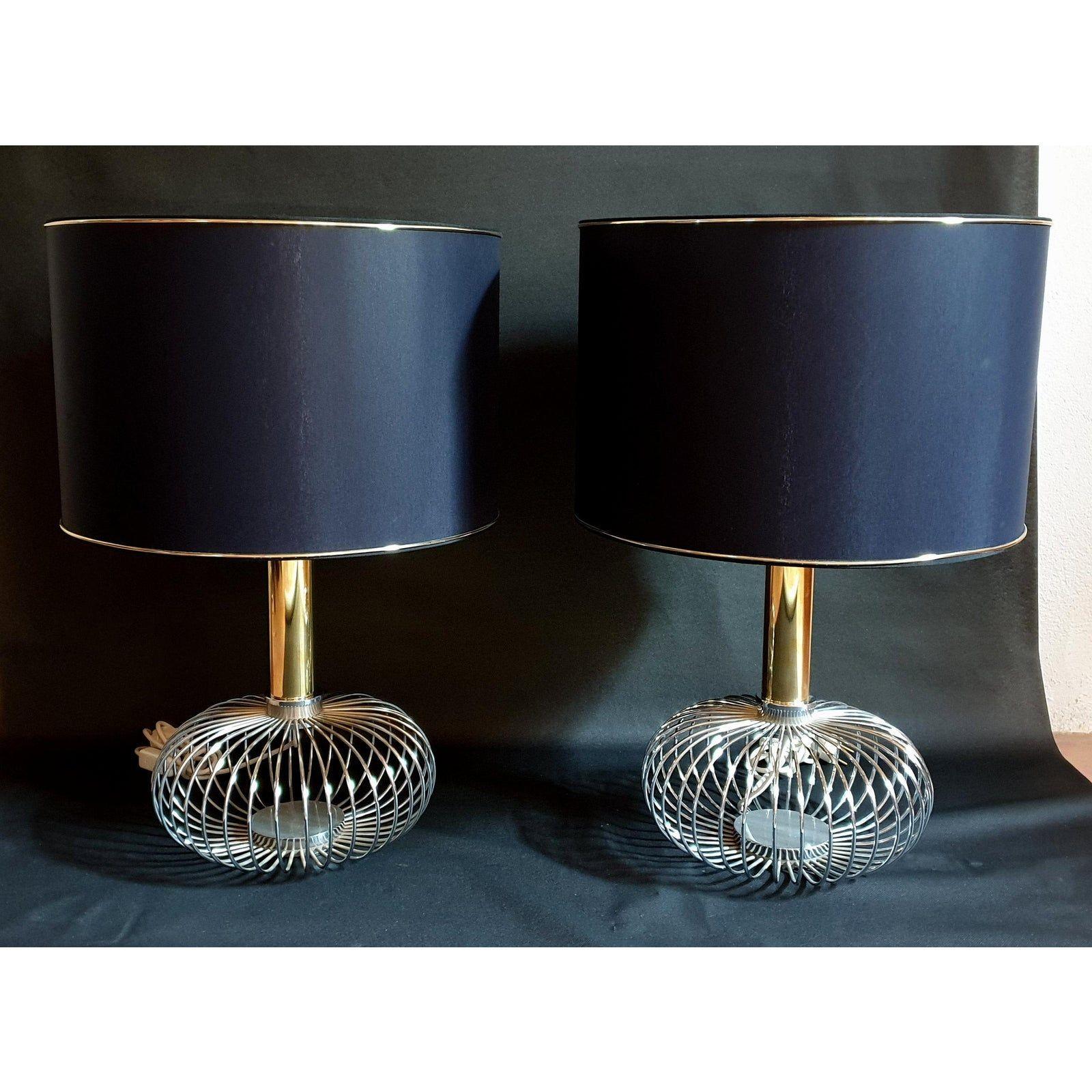 Pair of Mid-Century Modern table lamps, in chrome and brass, attributed to Sciolari, Italy 1970s.
The mid century table lamps have their original shades, in black fabric outside and gold metallic finish inside.
1 light each, rewired for the US.
The