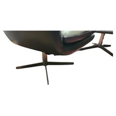 Pair of Mid Century Modern Italian Grey Leather Swiveling Lounge Chairs