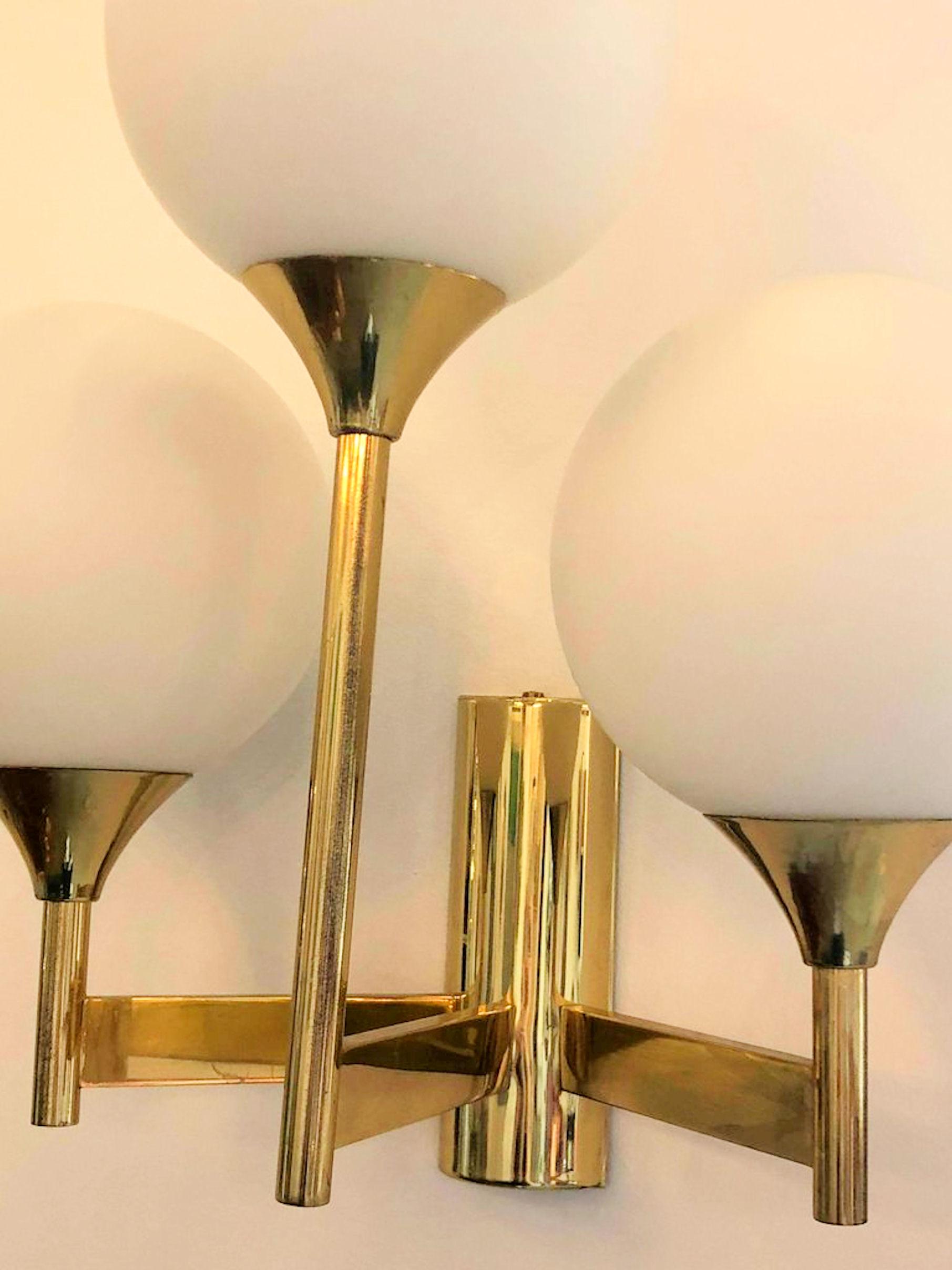 Pair of Mid-Century Modern White Globe and Brass Sconces by Kaiser Idell, 1960s In Excellent Condition In Dallas, TX