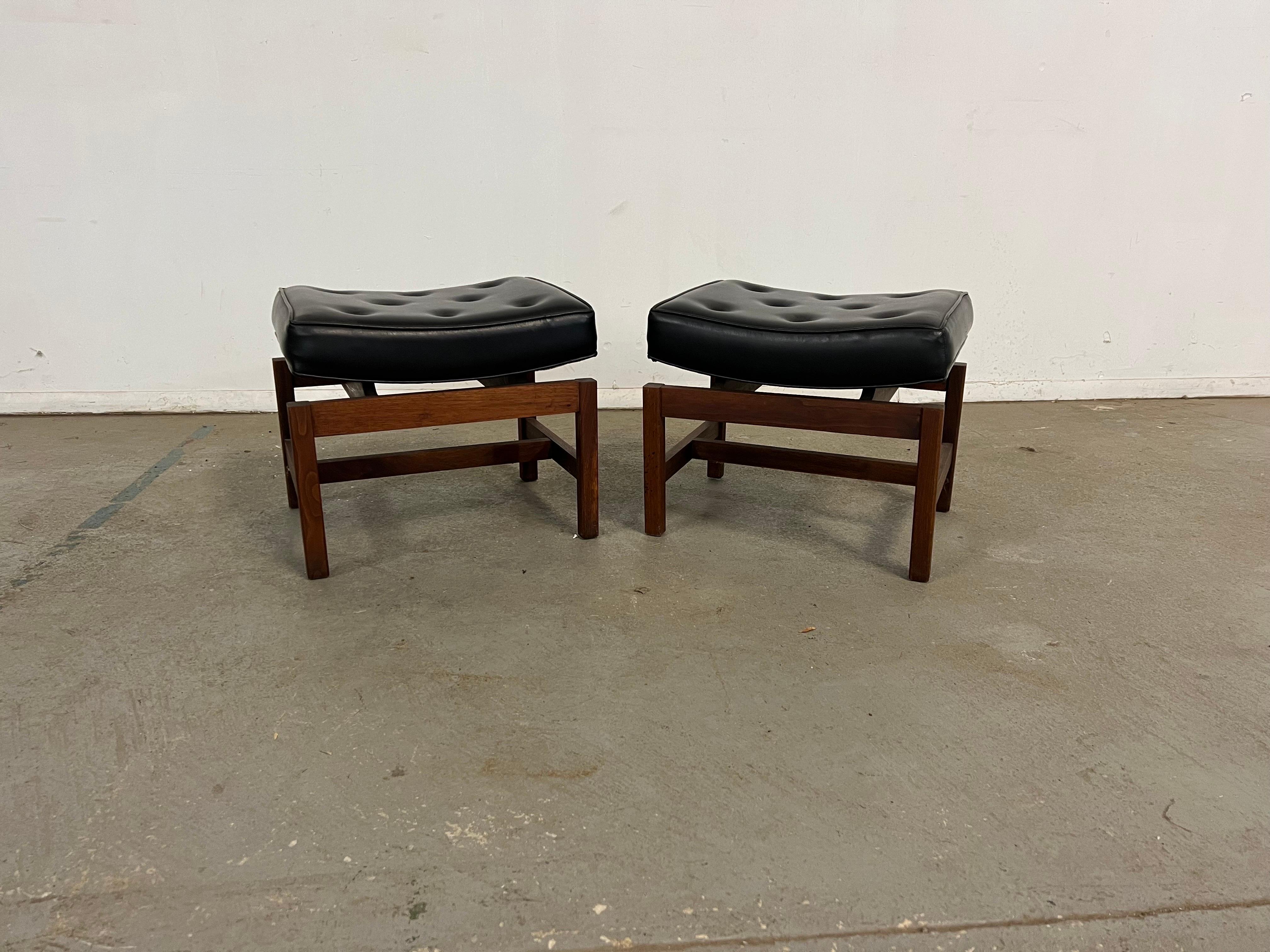 Pair of Mid Century  Modern Jens Risom Floating Top Walnut Stools
Offered is a Pair of Mid Century  Modern Jens Risom Floating Top Walnut Stools. This set includes two stools(we have amatching bench that accomodates these stool being sold