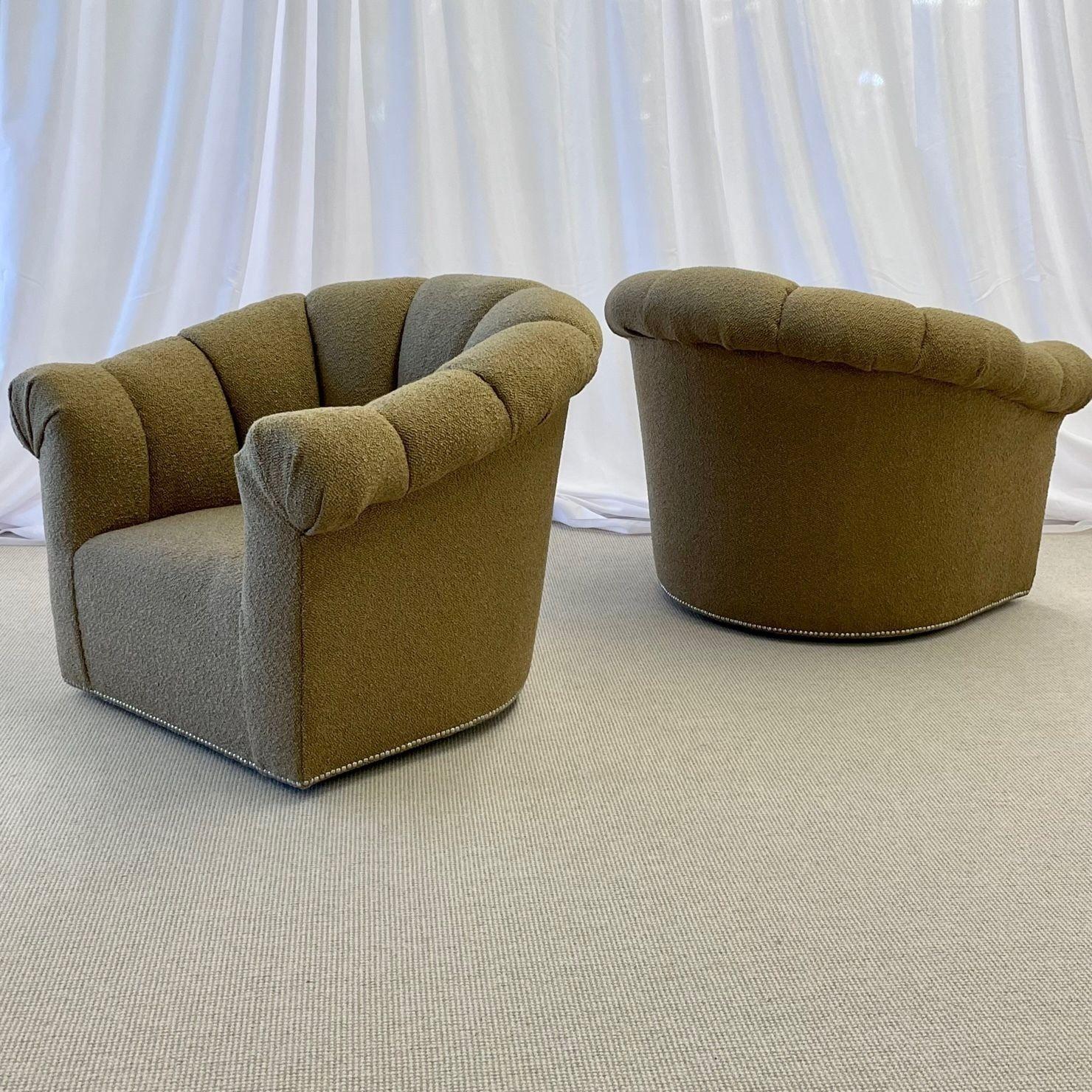 Pair of Mid-Century Modern Milo Baughman Swivel / Lounge / Tub Chairs, Boucle
 
A sleek and stylish pair of custom quality springer barrel back lounge chairs. Each having channel backs on sturdy comfortable seats with vintage wooden swivel on full