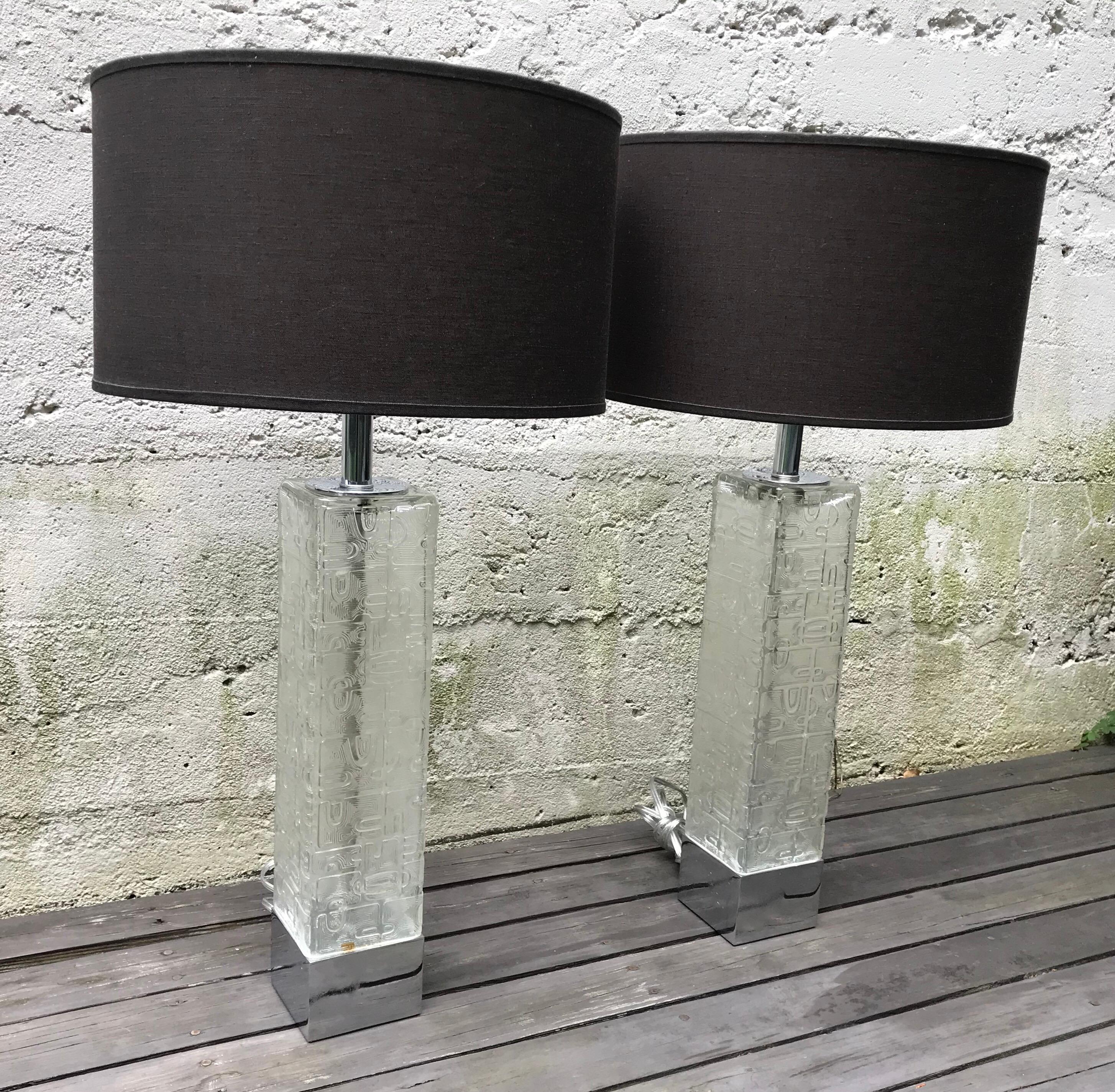Very cool pair of large clear etched glass table lamps with chrome base and accents. Rewired, shades not included.
