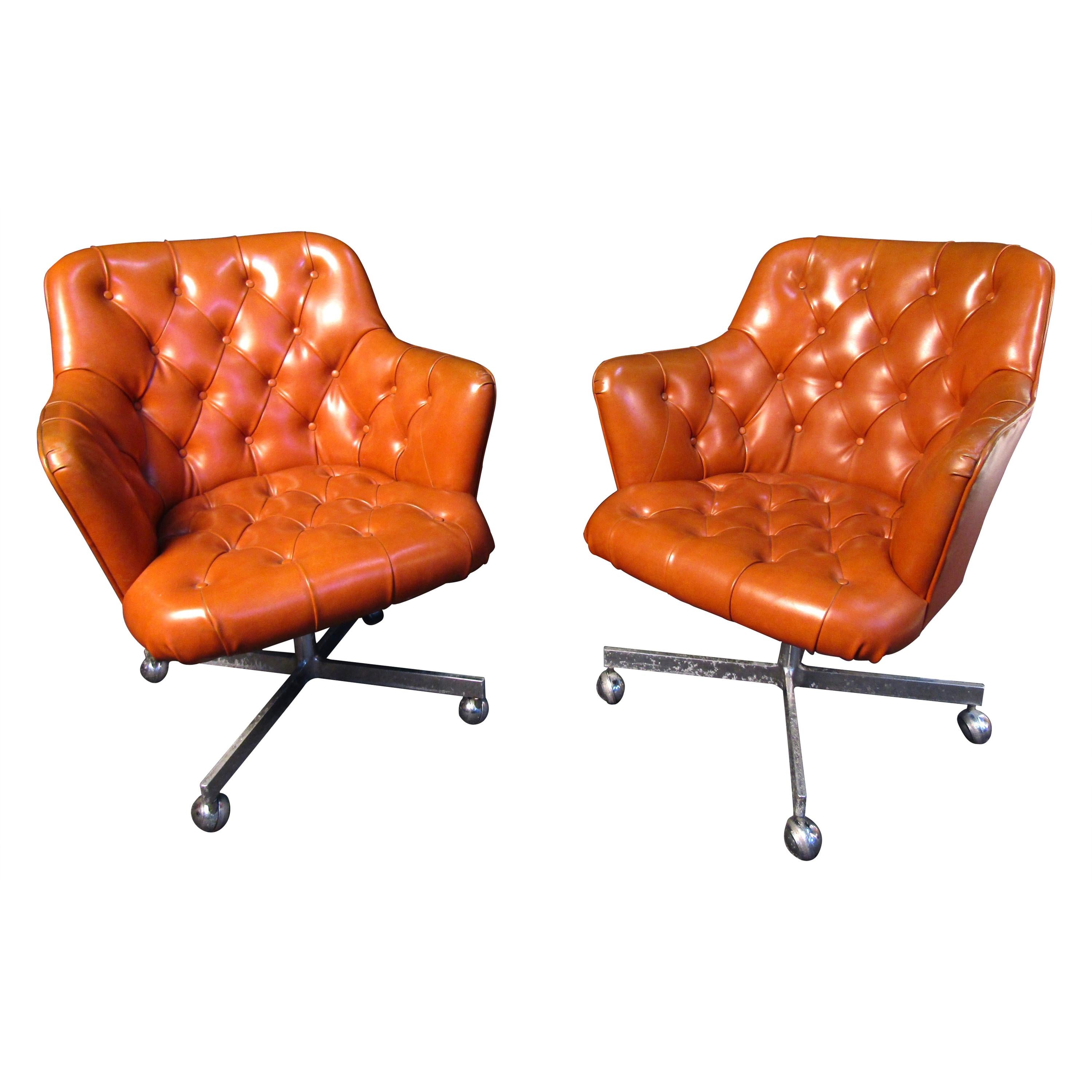 Pair of Mid-Century Modern Leather and Chrome Rolling Armchairs