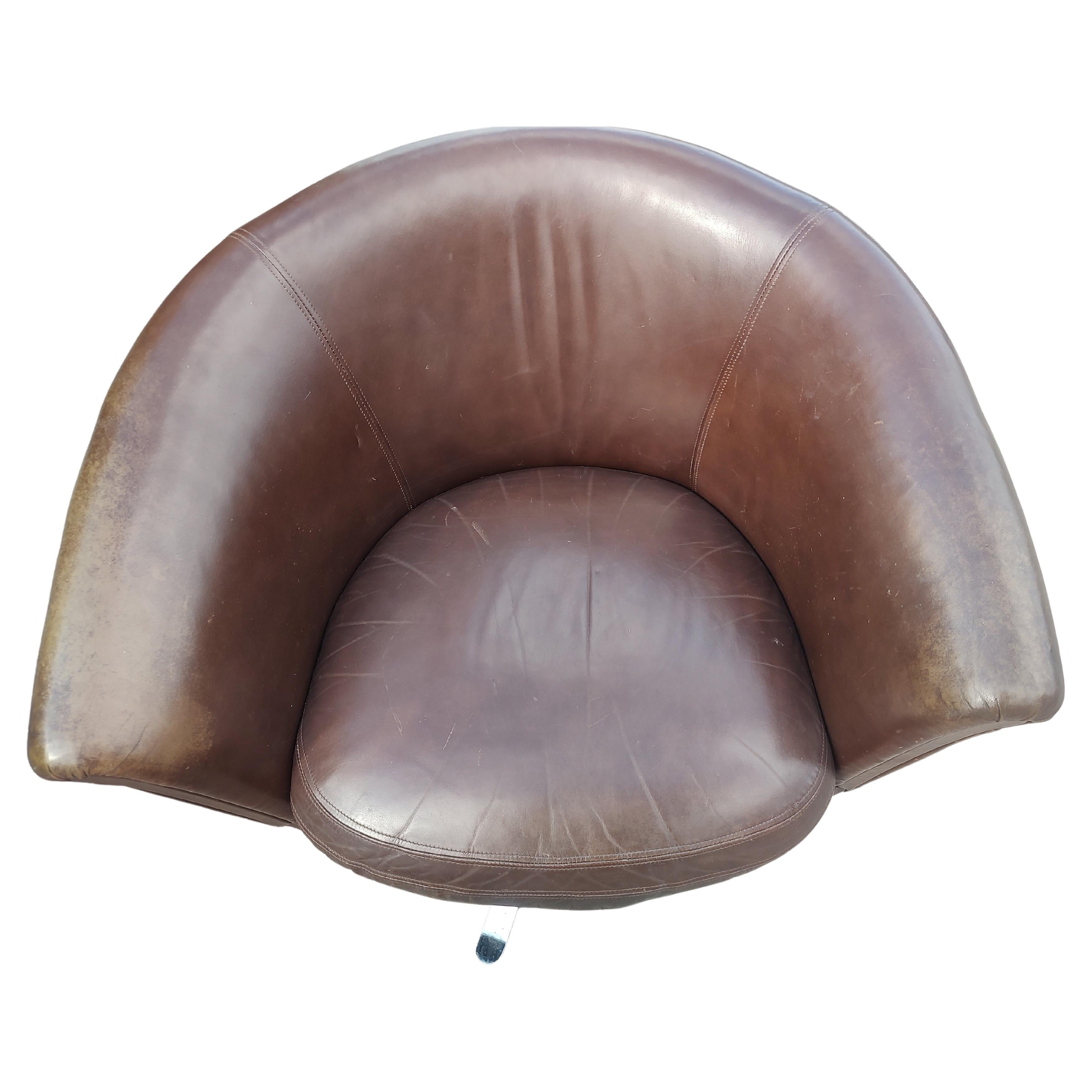 American Pair of Mid Century Modern Leather Swiveling Lounge Chairs with an Ottoman C1965 For Sale