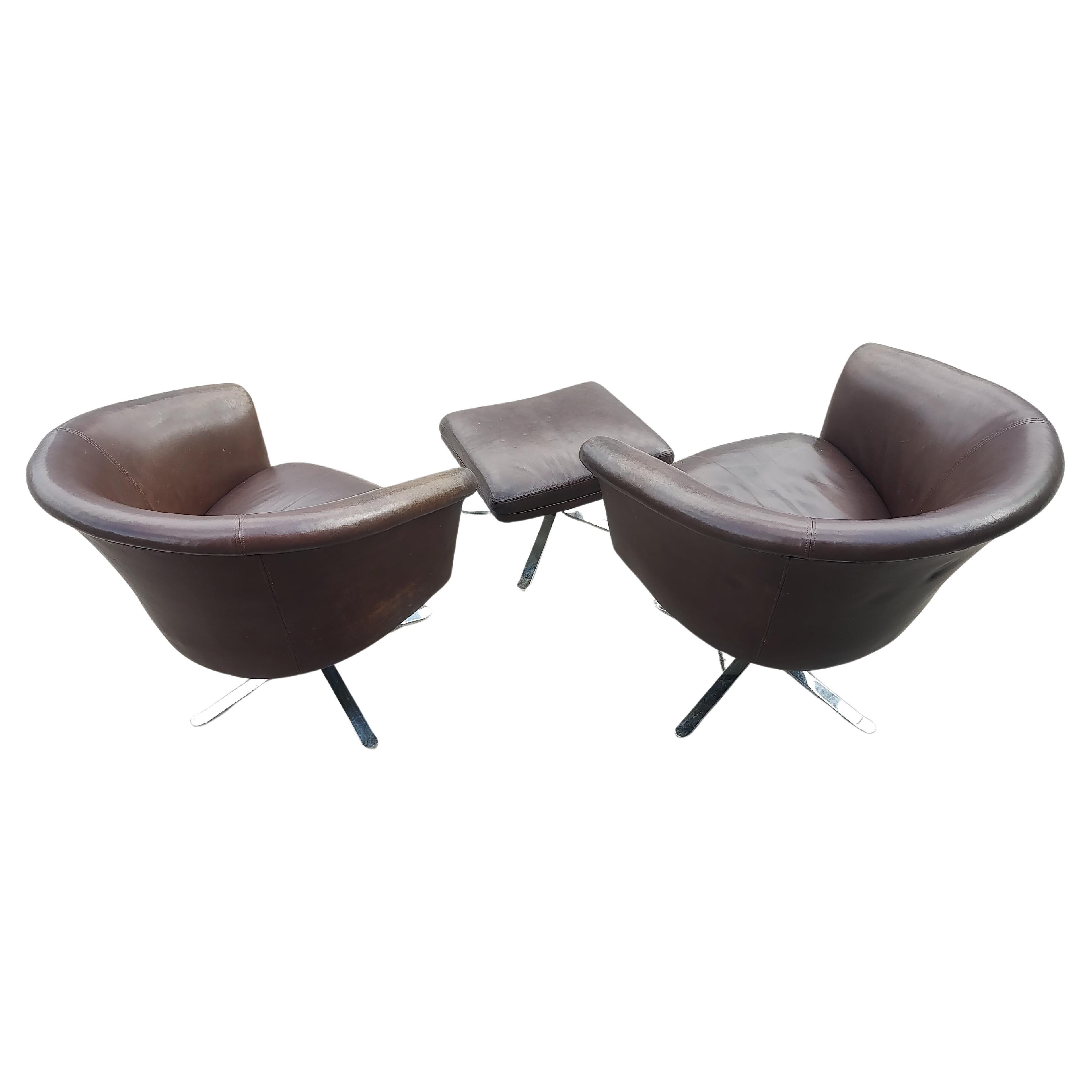 Mid-20th Century Pair of Mid Century Modern Leather Swiveling Lounge Chairs with an Ottoman C1965 For Sale