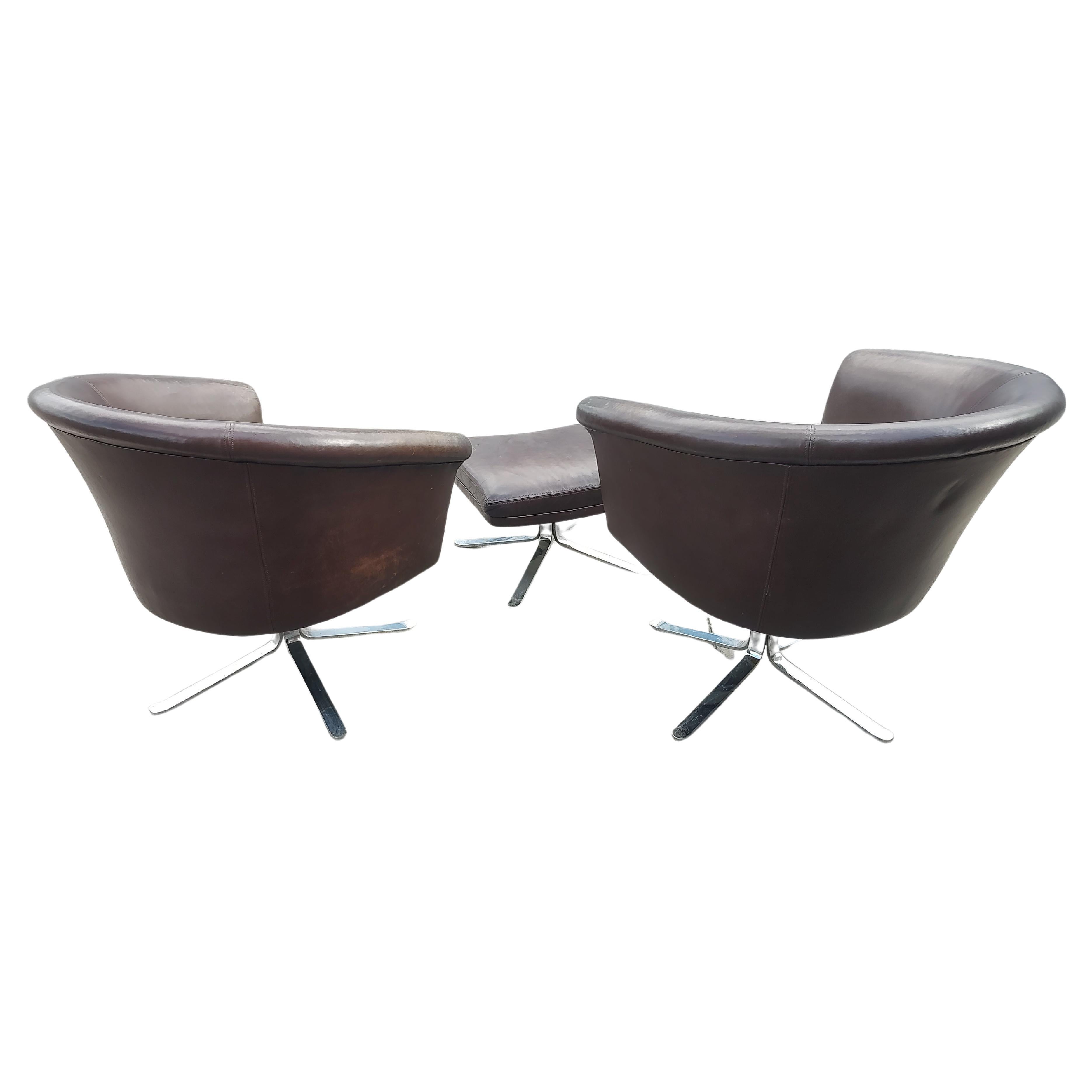 Steel Pair of Mid Century Modern Leather Swiveling Lounge Chairs with an Ottoman C1965 For Sale