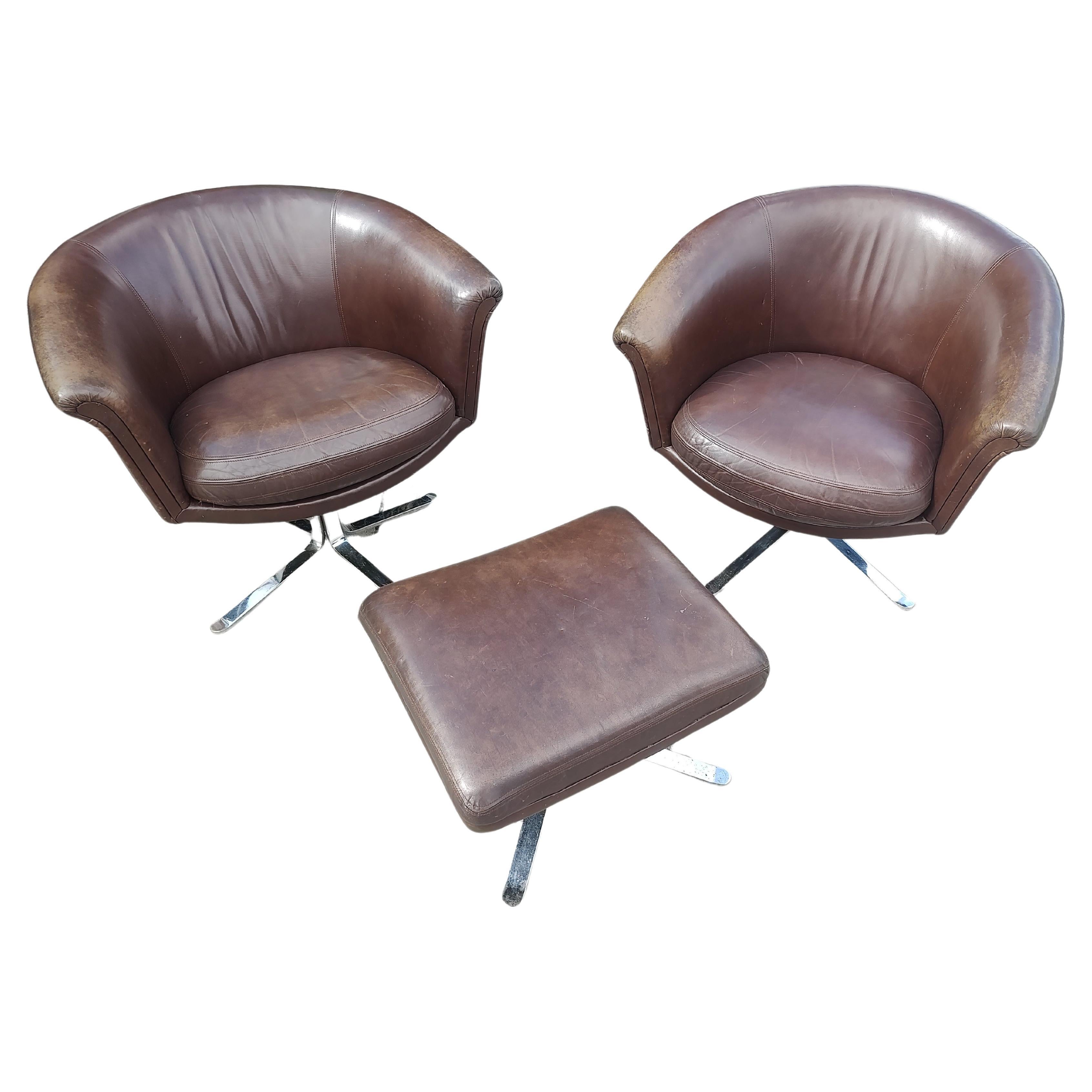 Pair of Mid Century Modern Leather Swiveling Lounge Chairs with an Ottoman C1965 For Sale