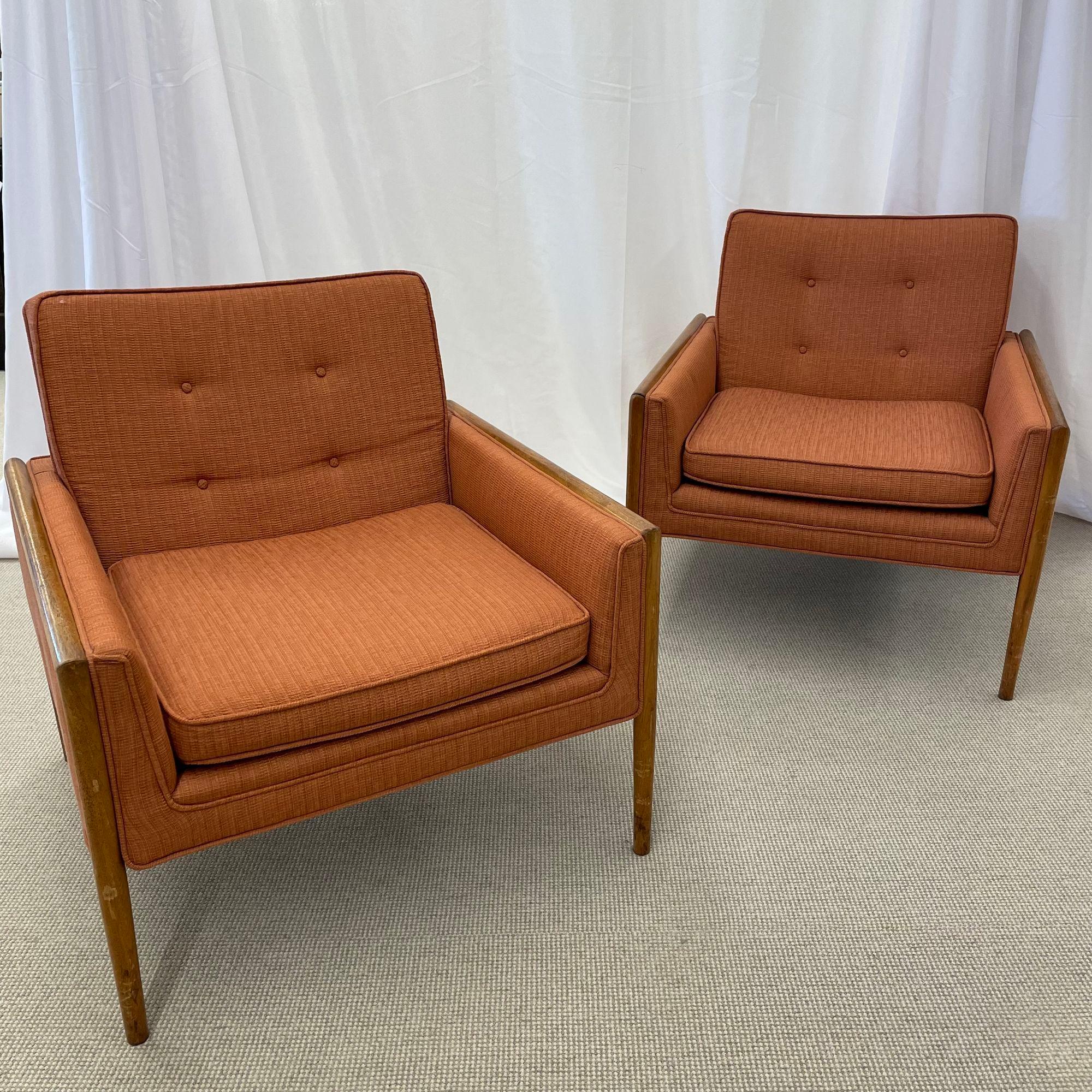 Pair of Mid-Century Modern lounge chairs.

These sleek and elegant arm or lounge chairs from the 1960s depict the Mid Century Modern era at its peak. Each having strong sturdy frames covered in their original tweed fabric. The box form sides, back