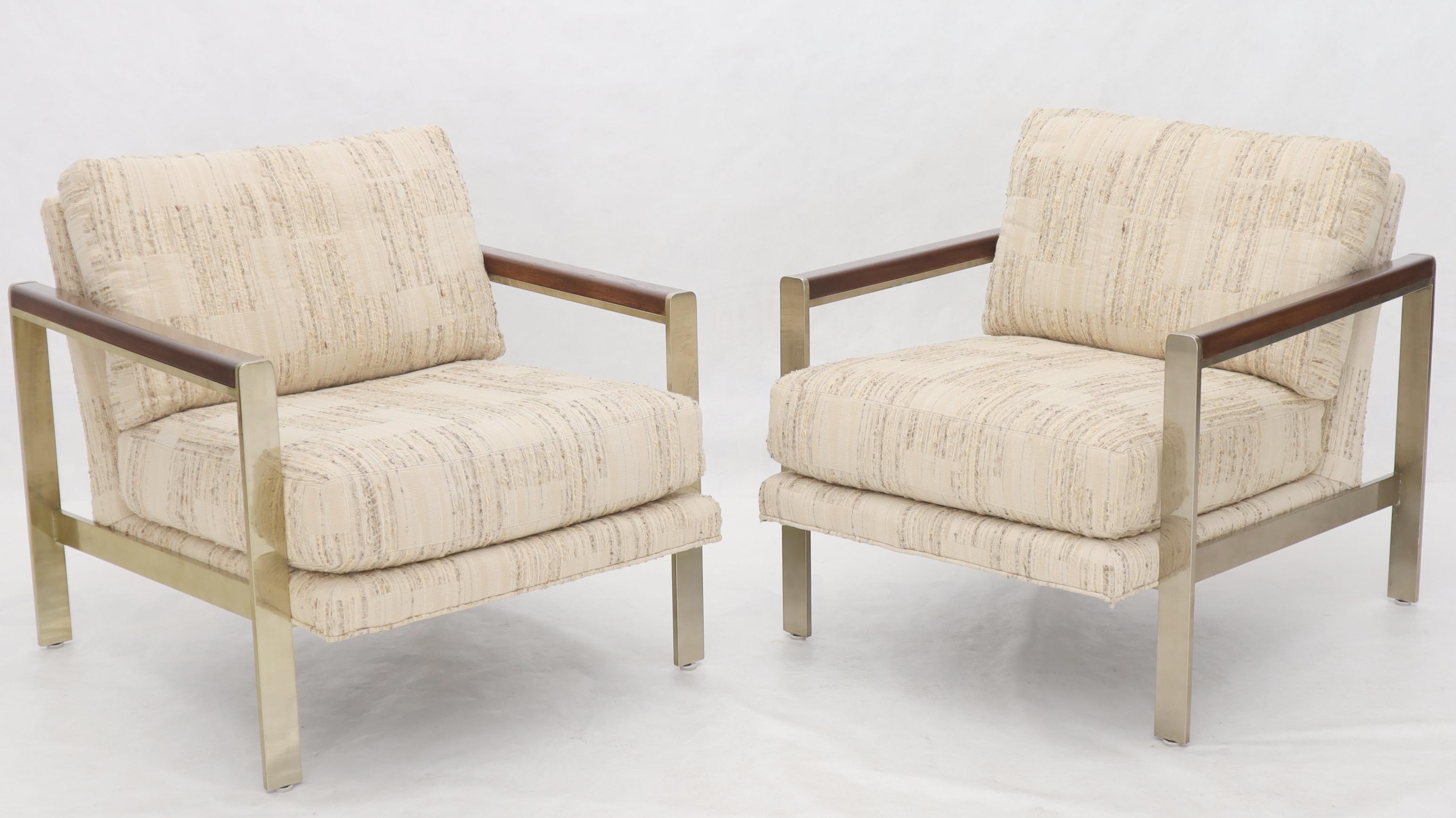 Pair of heavy brass finishes walnut arms lounge chairs by Drexel. Super comfortable good looking mint condition original seats and upholstery.