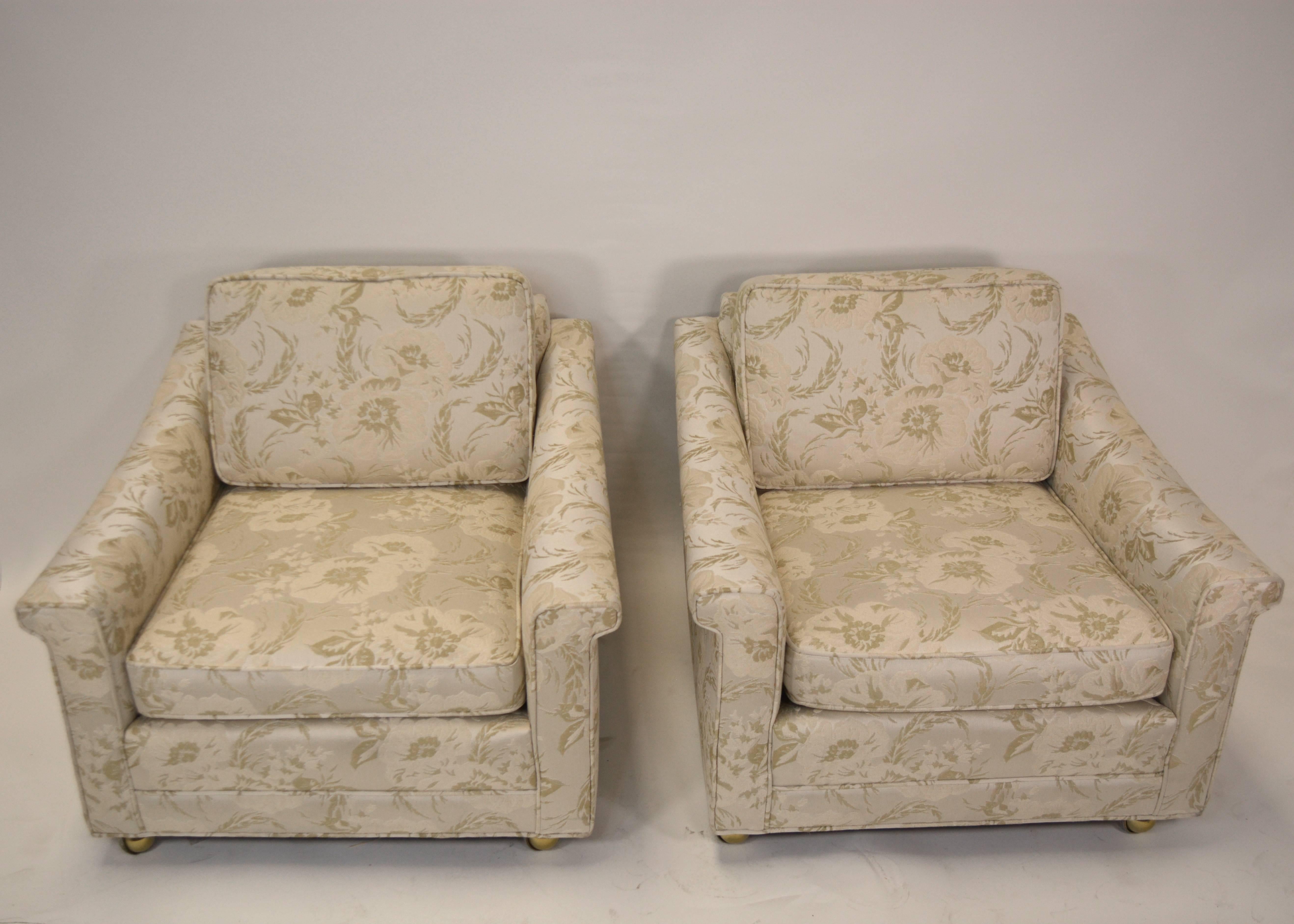 a good pair of mid-century modern club chairs from Red Skelton's Palm Spring Estate. on casters with the original cream floral fabric. Hollywood Regency chic at its best.