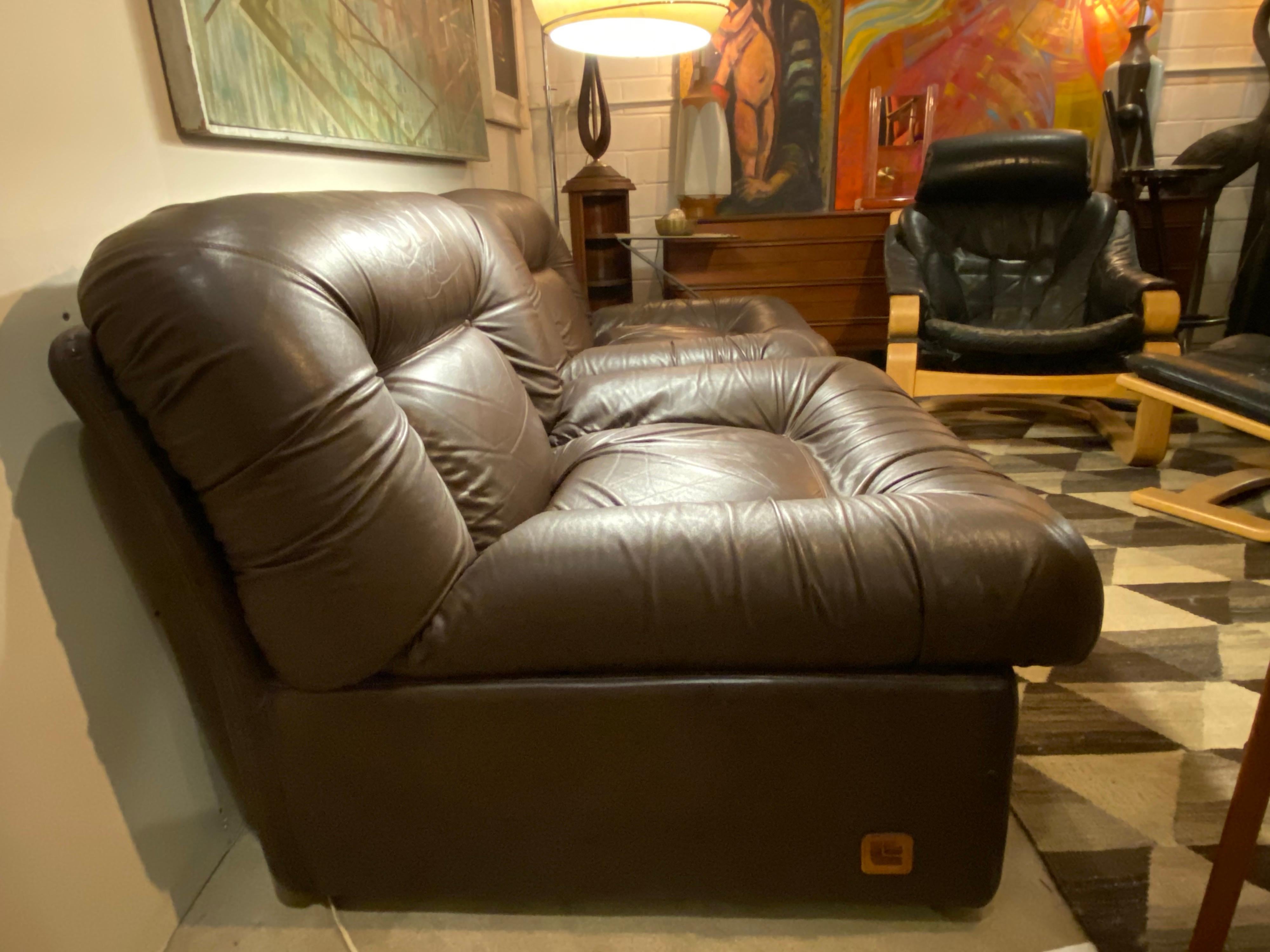Beautiful pair of Italian Mid-Century Modern lounge chairs made by Lev & Lev is made of leather, very comfortable, and in great vintage condition.