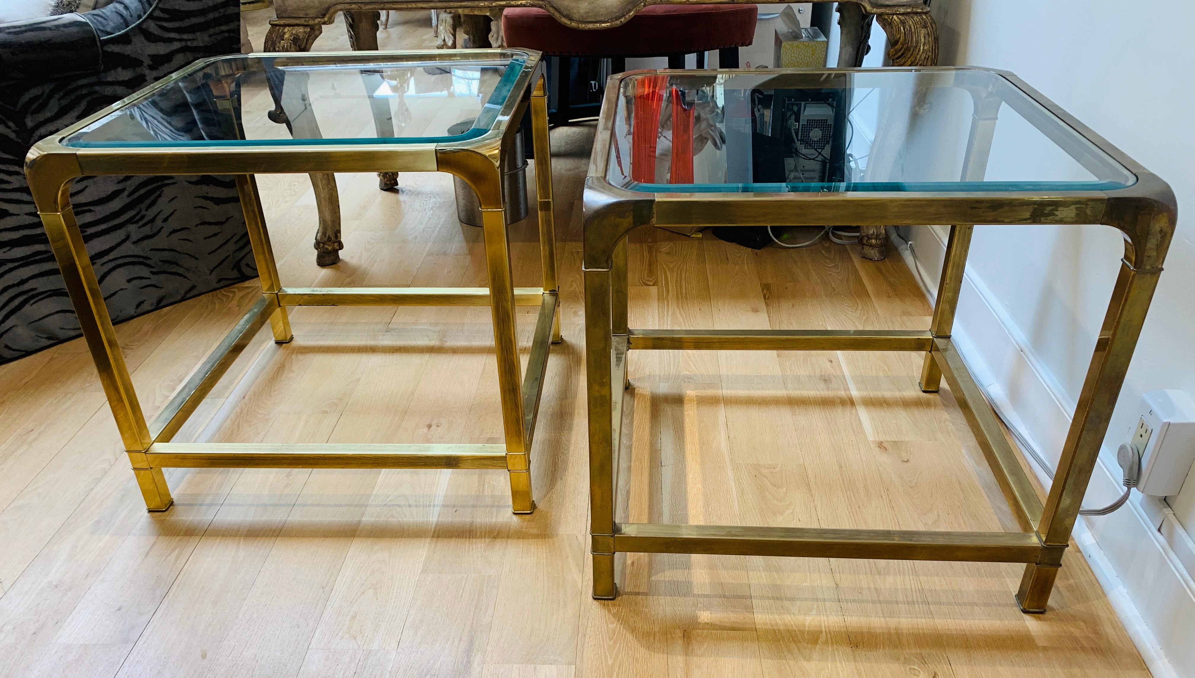 Brass Mastercraft side tables, with beveled glass top.