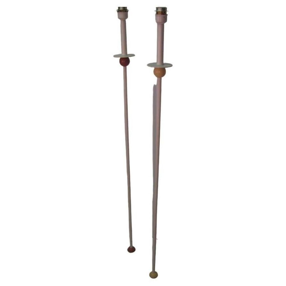 Fabulous painted steel floor lamps by Memphis in original condition. Shades have different diameter as well as the color. In excellent vintage condition with minimal wear. New wiring.