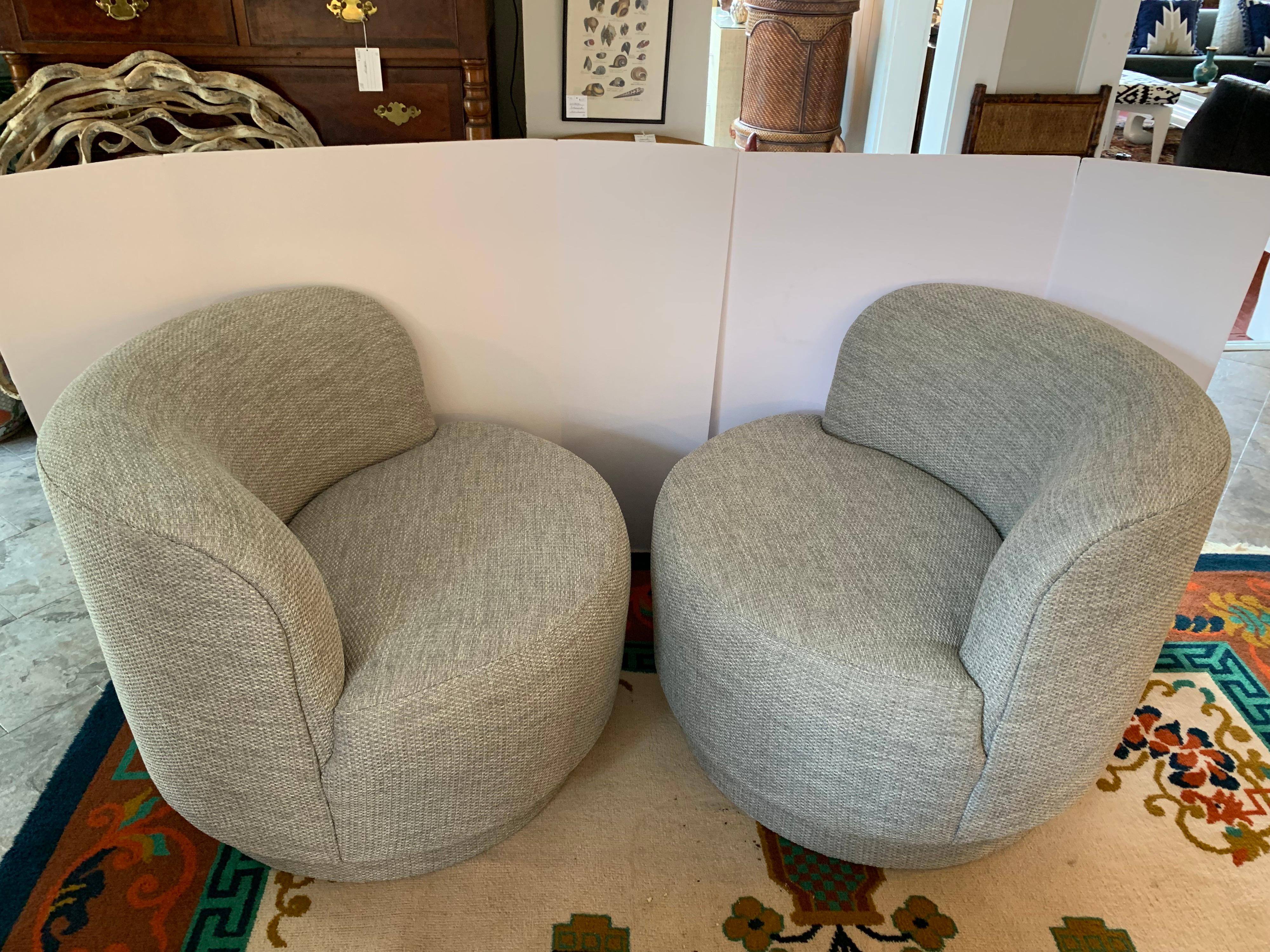 Iconic gray upholstered swivel chairs with great scale and lines.
Not too big, not too small, just perfect. Newer upholstery.