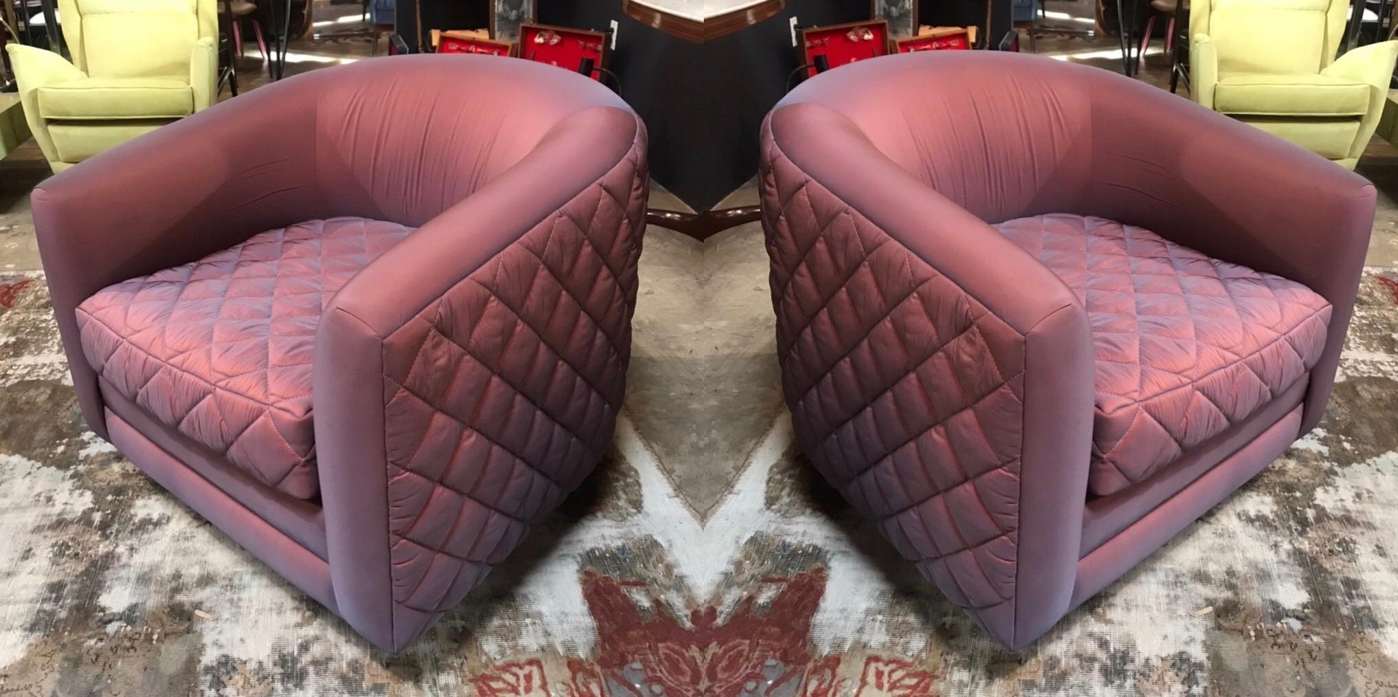 Pair of swivel chairs on walnut bases.
The re-upholstery is in silk with different patterns for the seat and for the back.
The walnut base has a chromed treatment.