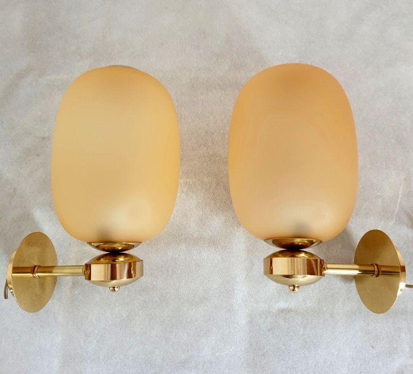 Mid-Century Modern Pair of amber Murano Sconces, Italy For Sale