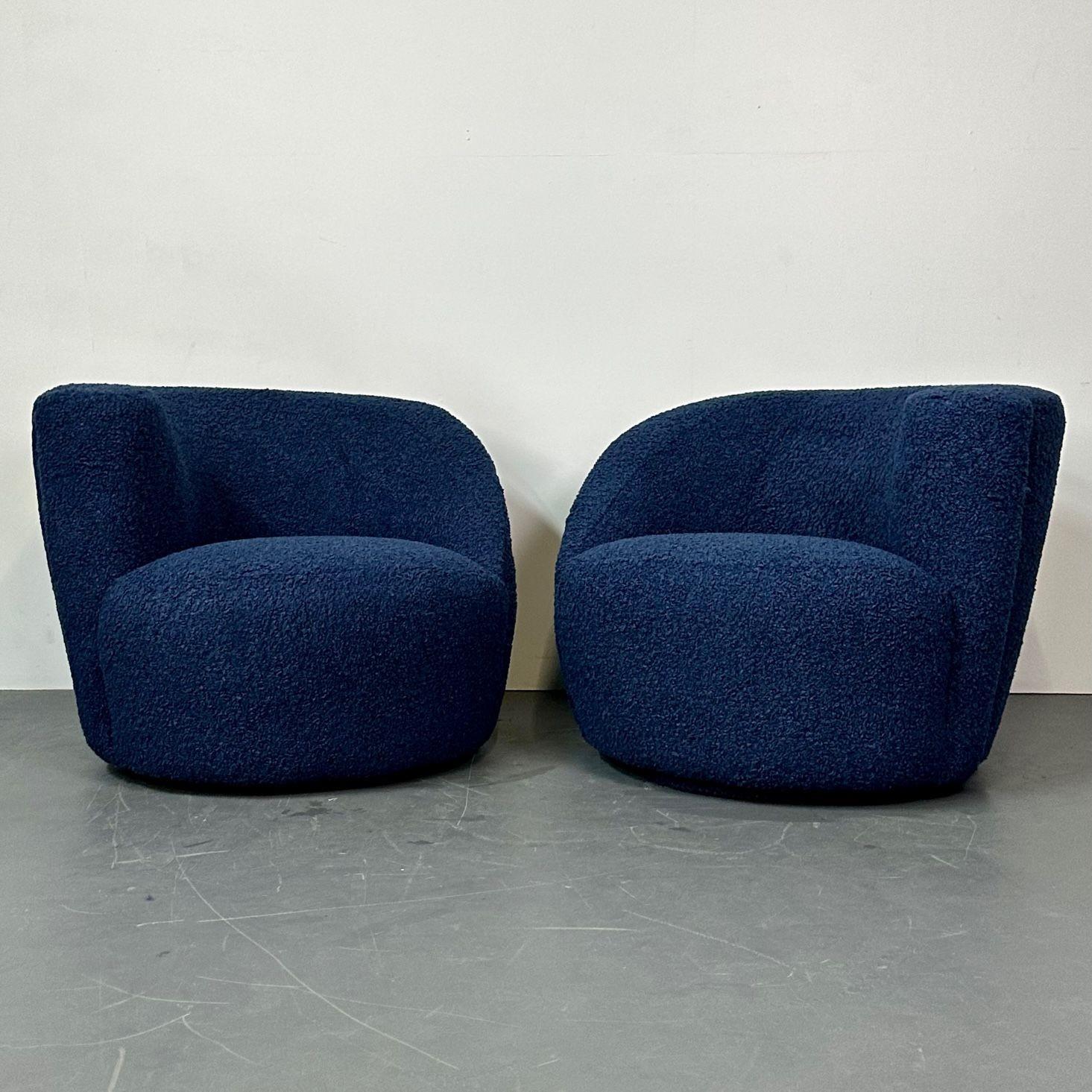 Pair of Mid-Century Modern Nautilus Style Swivel / Lounge Chairs, Blue Faux Fur
Opposing organic form kidney shaped swivel chairs newly upholstered in a fuzzy faux Sherpa boucle esque fabric. This design is similar to that of Vladimir Kagan's iconic