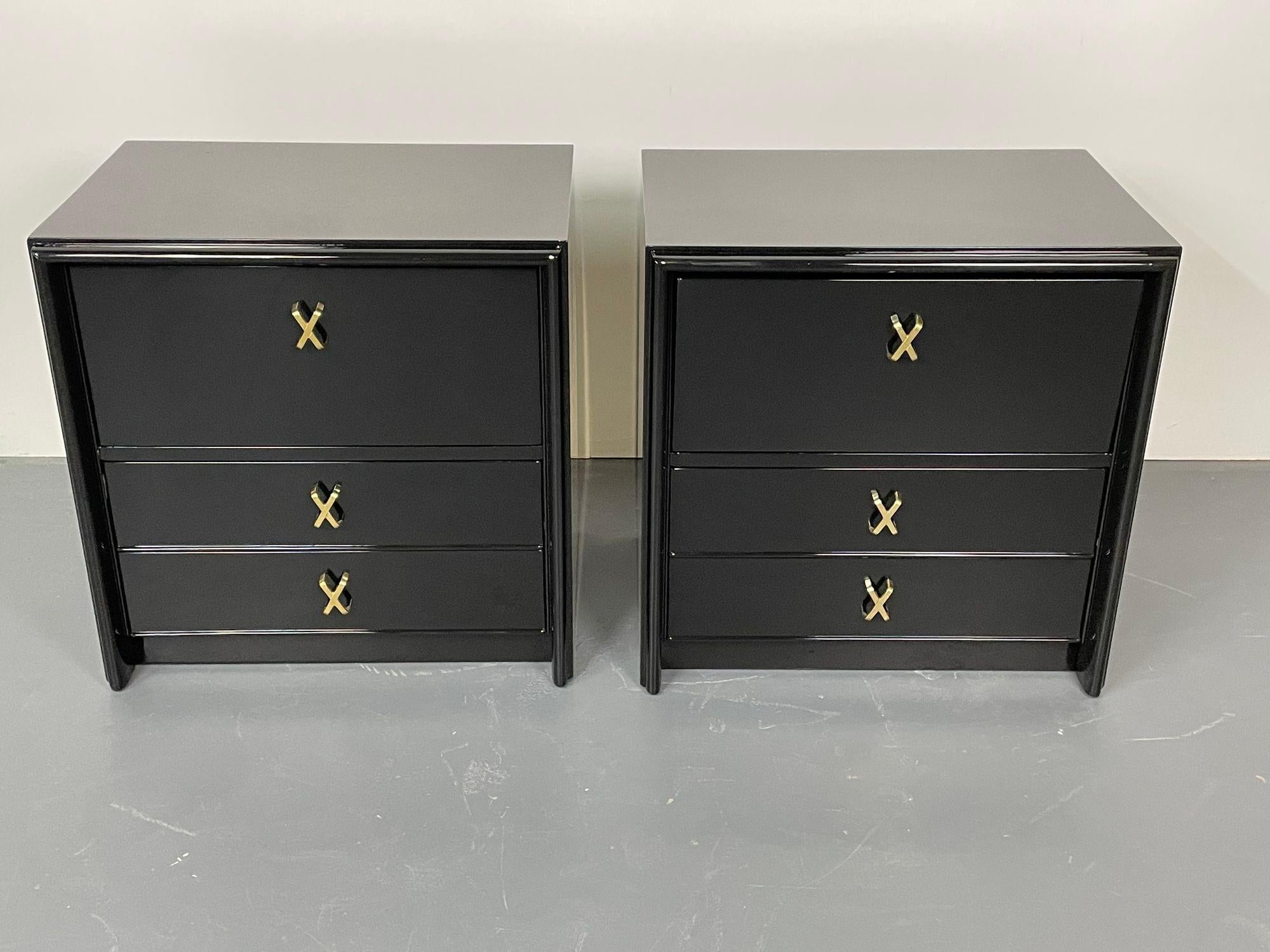 Pair of Mid-Century Modern night stands, bedside tables by John Stuart, ebony, fully refinished.

John Stuart Paul Frankl Designed Pair of Bedside Stands in the finest black lacquered finish. Part of a complete bedroom set sold separately this