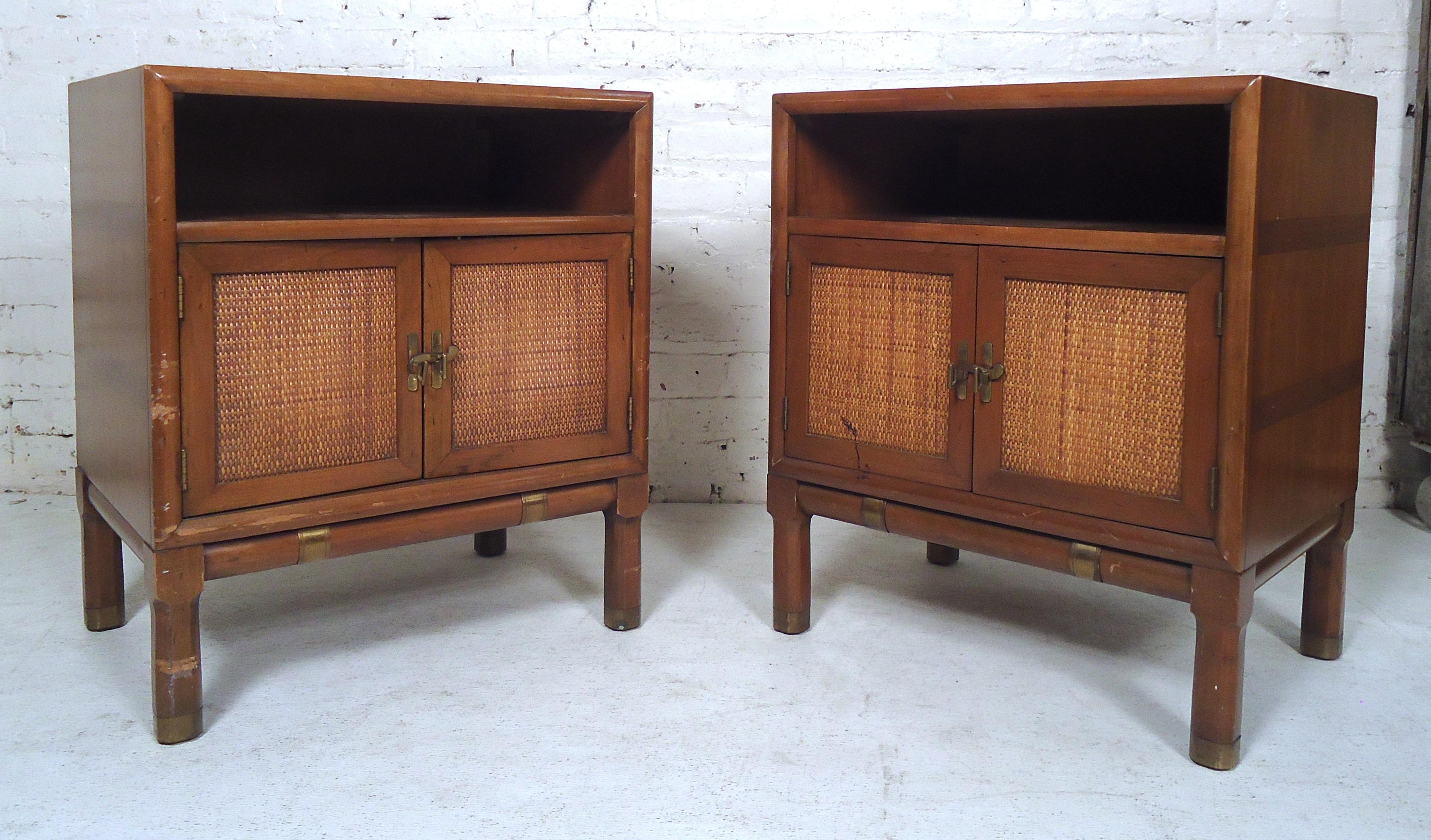 Gorgeous pair of vintage modern side tables featuring a rattan front, brass accents and a spacious storage unit.

Please confirm item location (NY or NJ).