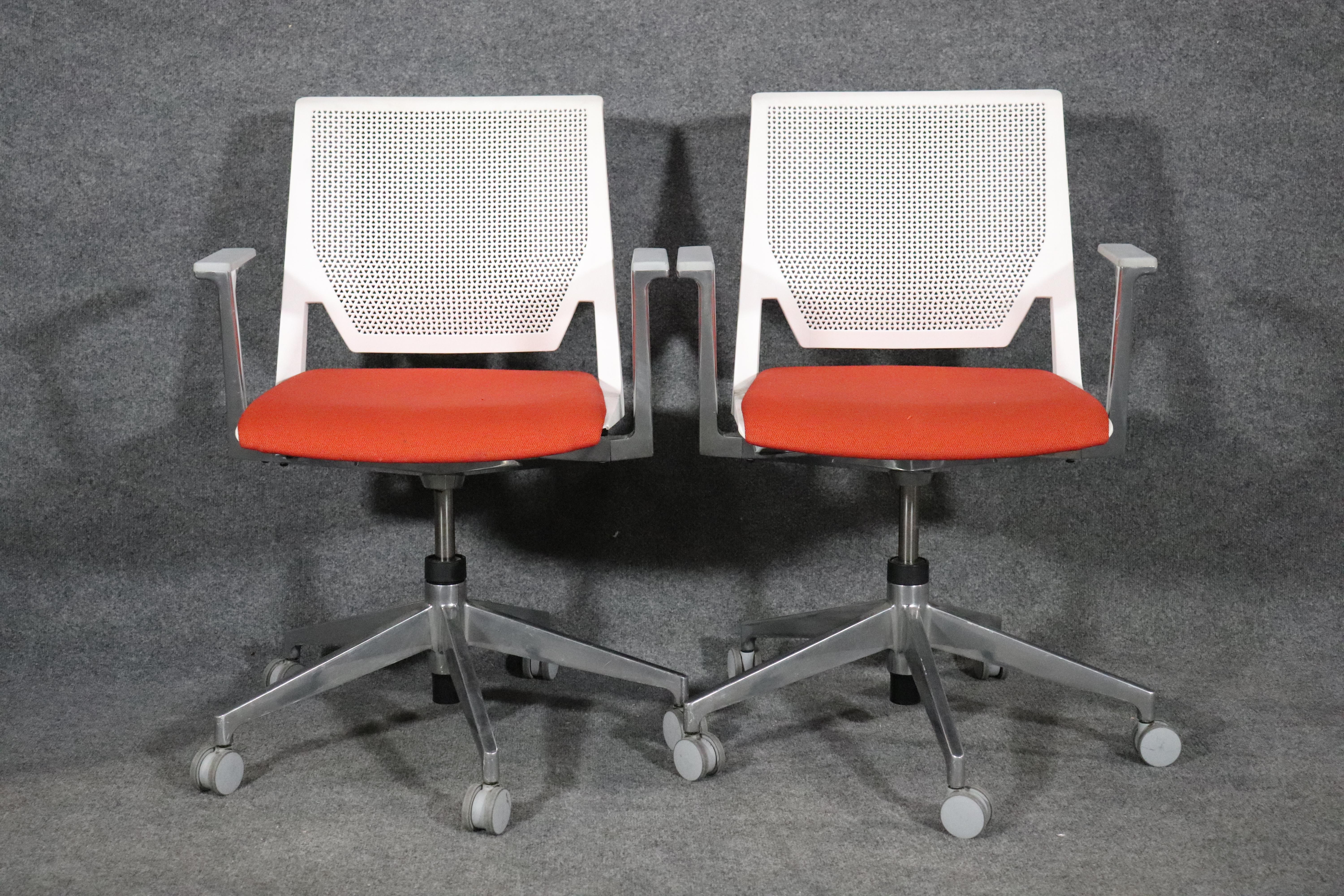 Mid-century rolling office chairs with modern style design. Soft plastic back rest and cushioned seat.
Please confirm location.