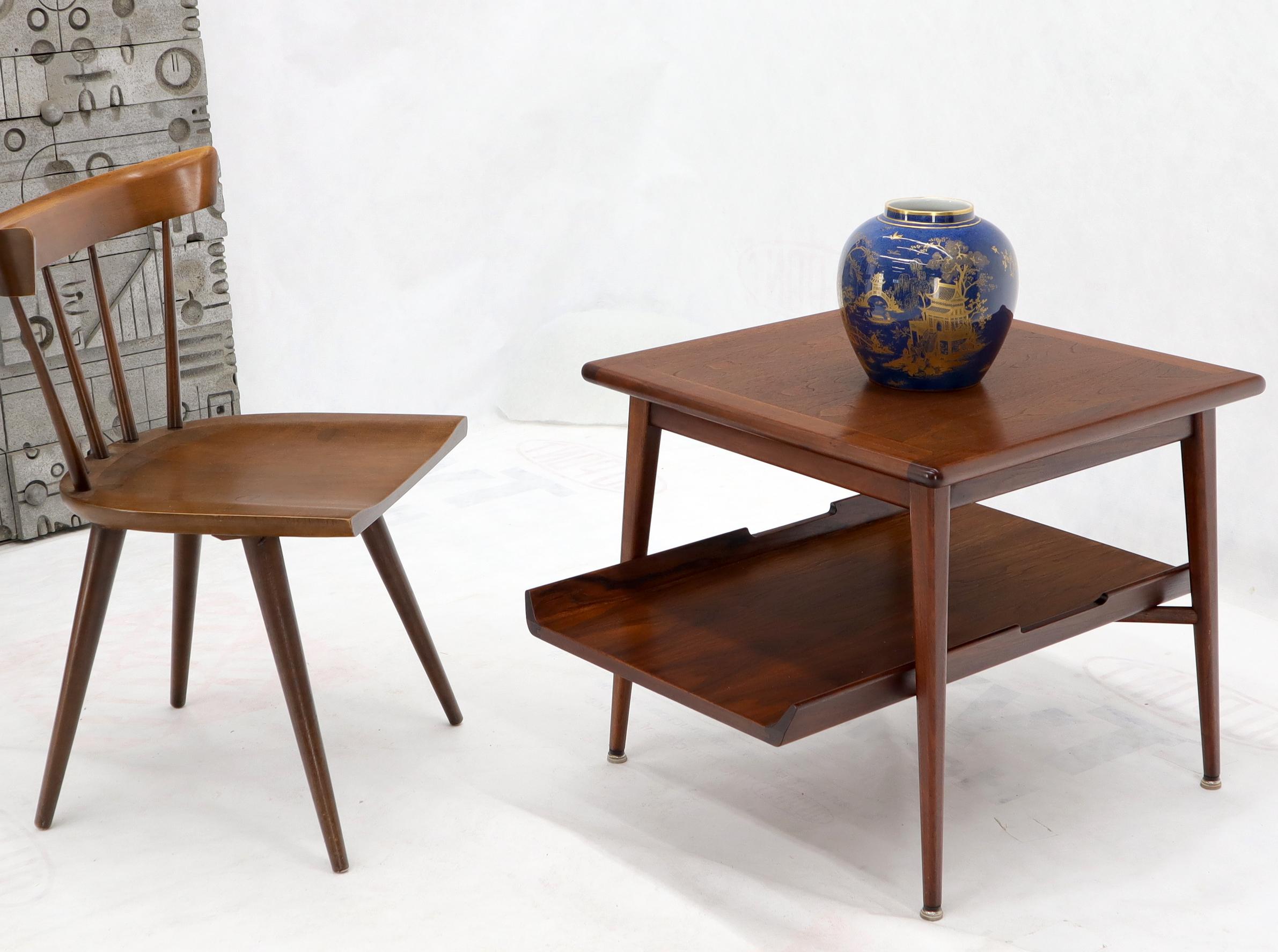 Pair of Mid-Century Modern two tier oiled walnut end side tables in stunning condition. Jens Risom Decor match.