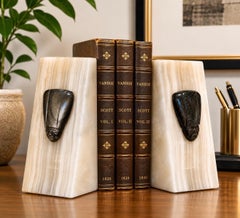 Pair of Mid-Century Modern Onyx and Carved Stone African Mask Bookends