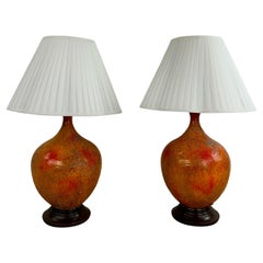 Pair of Mid Century Modern Orange Table Lamps with Lava Glaze