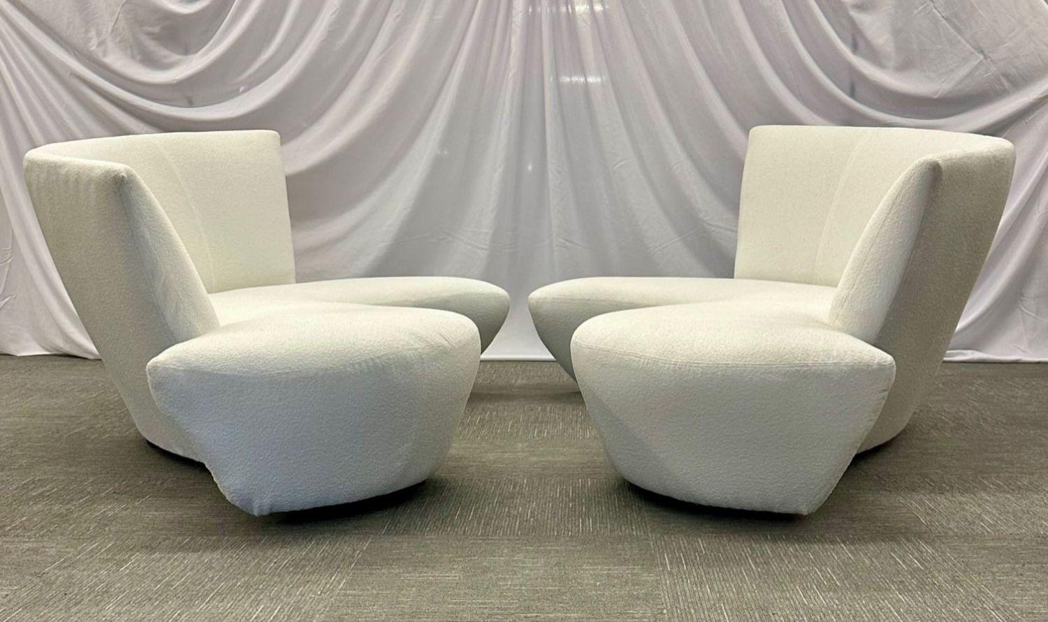 Pair of Mid-Century Modern Organic Vladimir Kagan Bilbao Sofas, White Boucle
 
Pair of handsome mid-century modern organic form sofas by Vladimir Kagan. Kagan originally drew inspiration for this dramatic design from the curves and undulations of