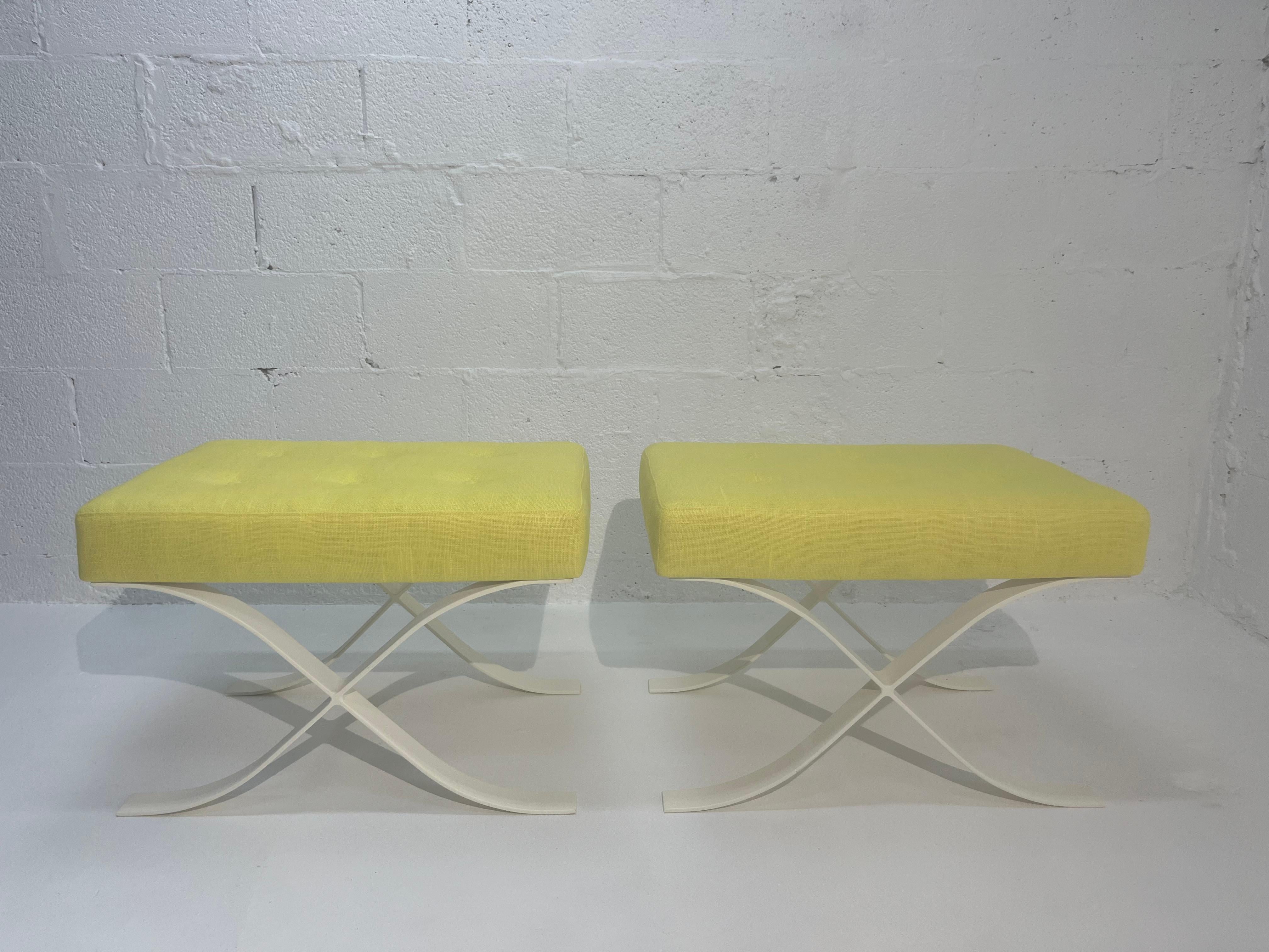 Pair of 1970 ottomans in the style of the Barcelona Series by Knoll.
Steel bases have a cream finish, seats were recently recovered in a beautiful yellow fabric. Ready for a new home.